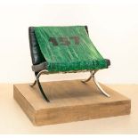 Martin Kippenberger, Untitled (157).Barcelona chair, sticky tape, foil script on wooden plinth. (