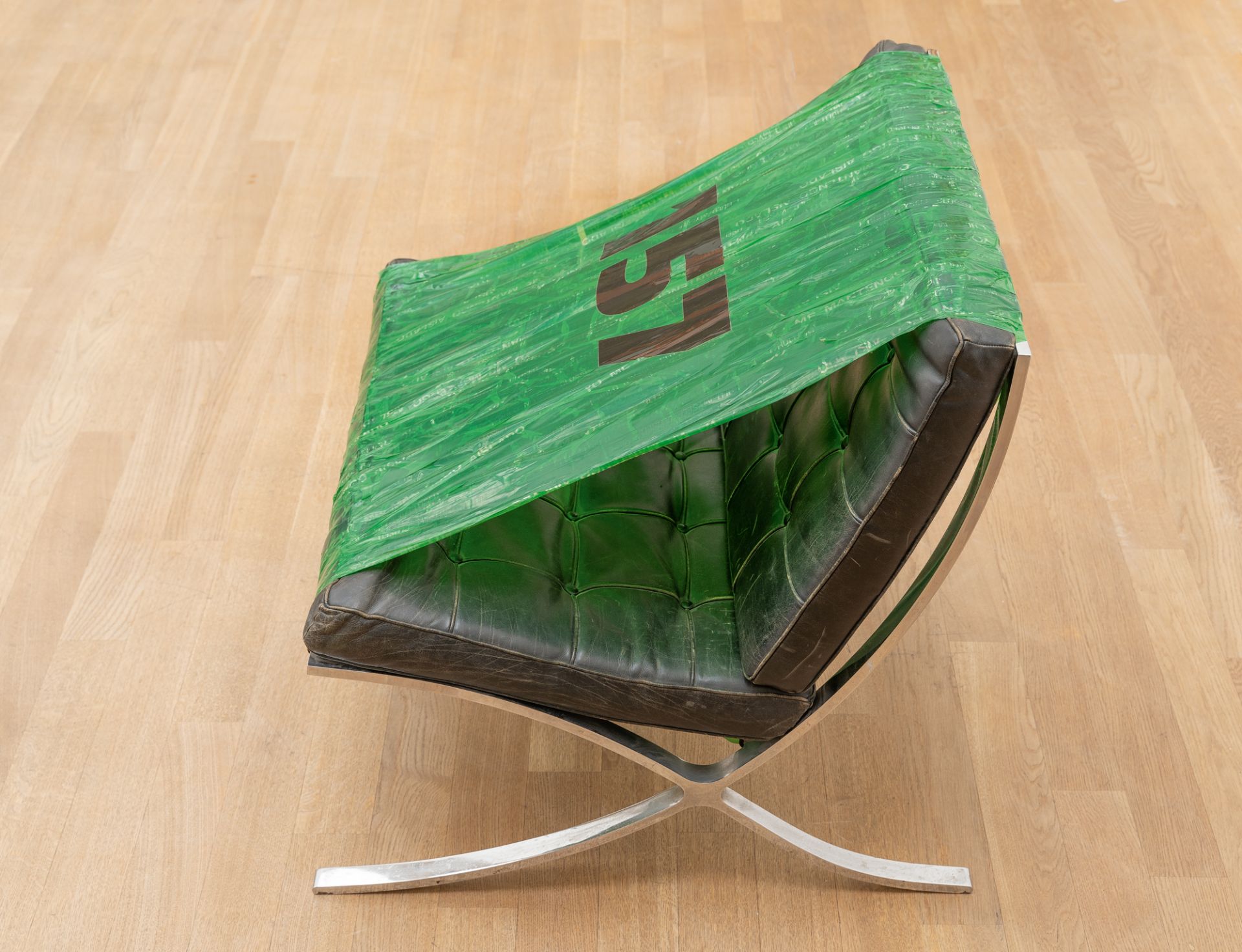 Martin Kippenberger, Untitled (157).Barcelona chair, sticky tape, foil script on wooden plinth. ( - Image 4 of 5