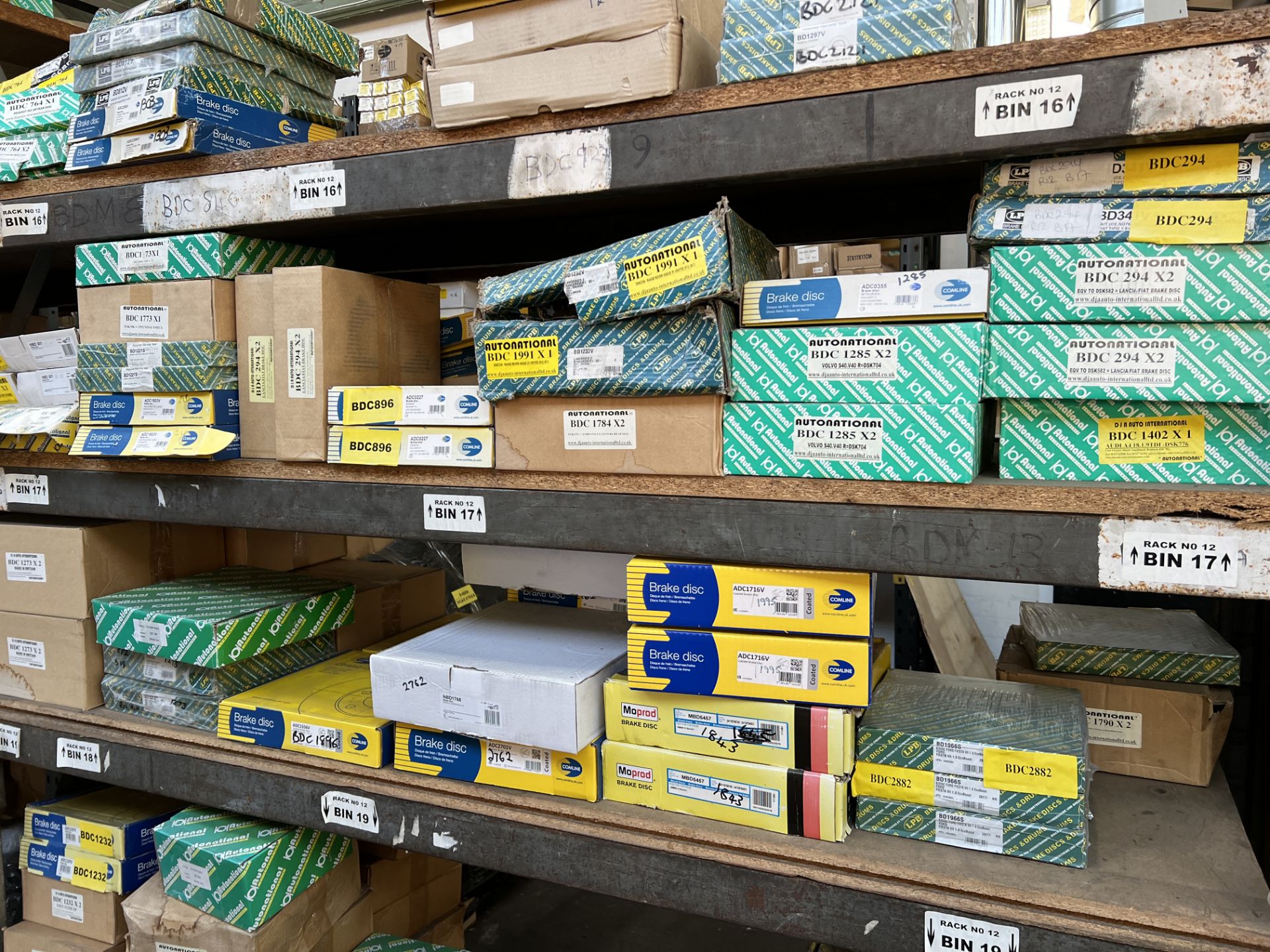 A Large Quantity of Brake Discs Situated on One Side of Pallet Racking as shown. This lot contains - Image 12 of 16