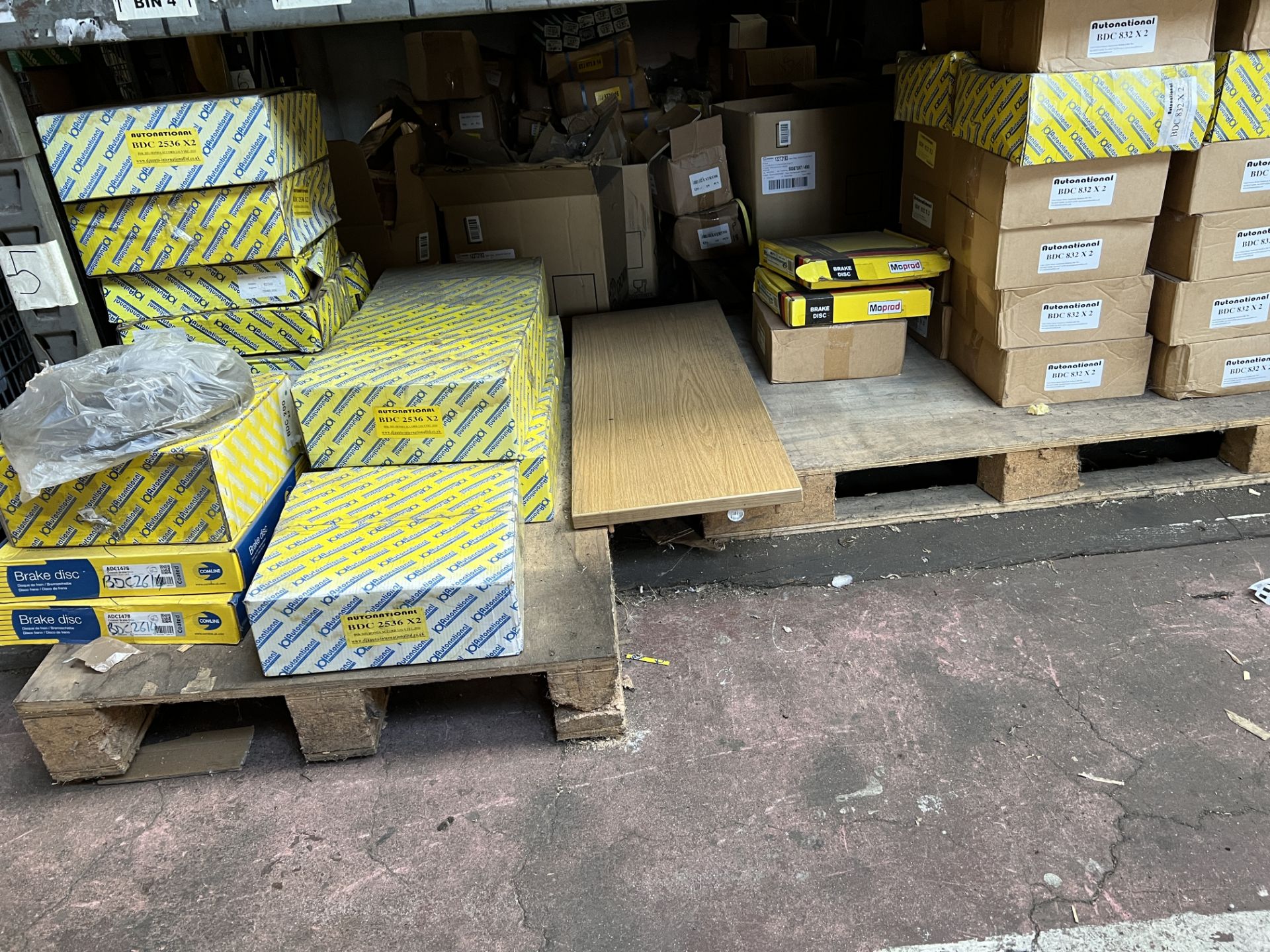 A Large Quantity of Brake Discs Situated on One Side of Pallet Racking as shown. This lot contains - Image 2 of 16