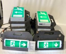 13x Emergency Exit Signs, mounted to wooden board Condition: Ex-Hire Emergency exit lights mounted