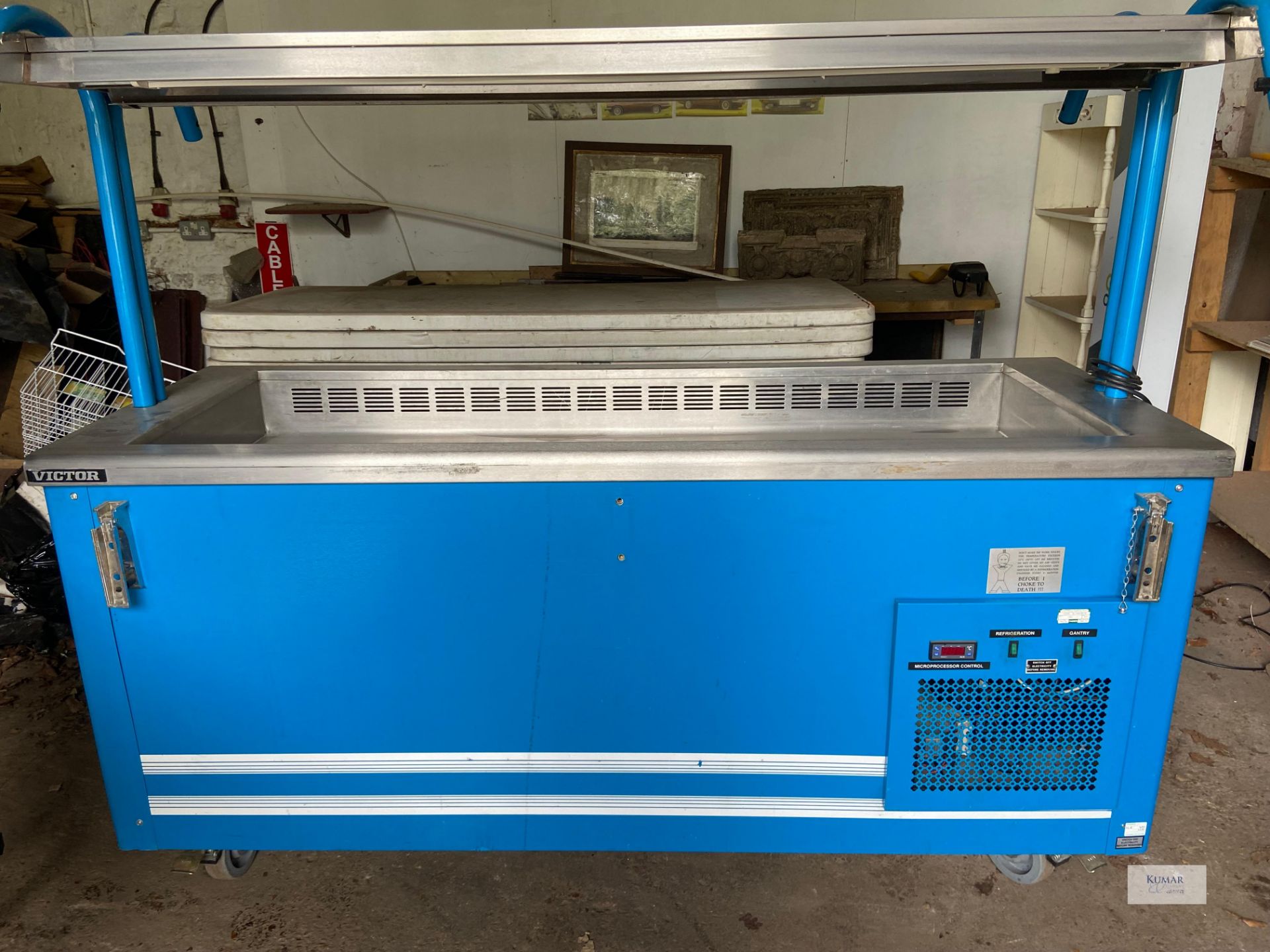 W190 D70 Counter height 95 Full height 160 Chilled drop well service counter. On castors and