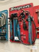 Snap On Hydraulic Porta Power Set on Wall Mounted Board - As Shown