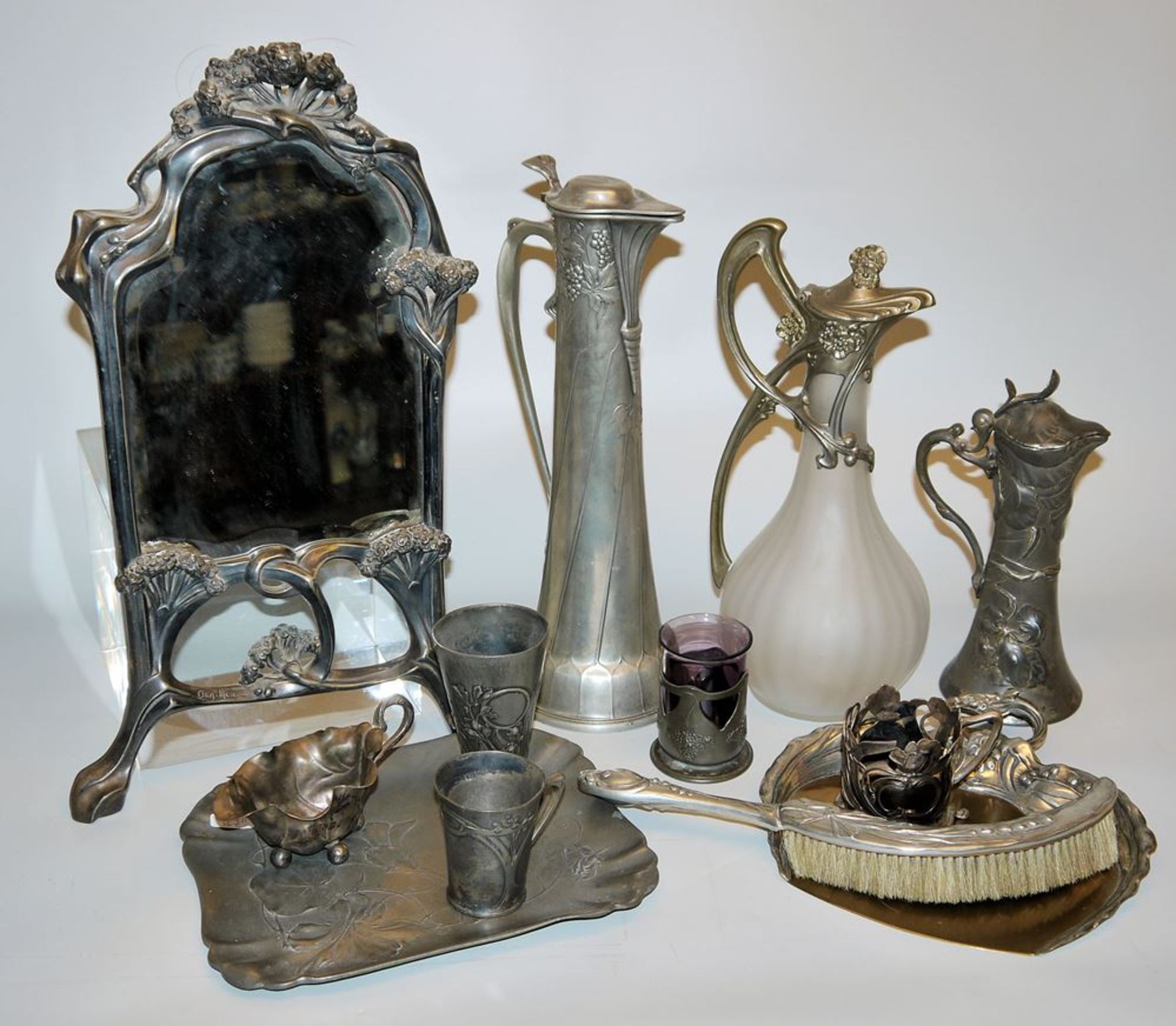 Mirror "Ombelles" by August Moreau and large collection of Art Nouveau pewter, Osiris, Orivit, WMF 