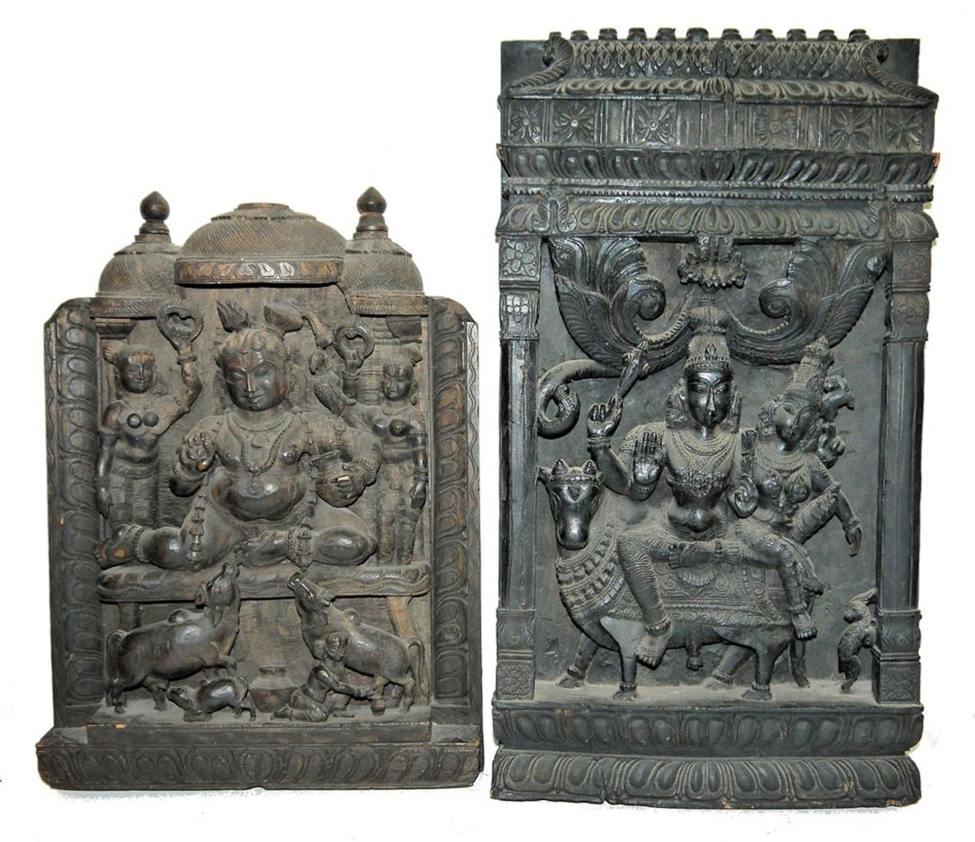 Two large-format relief panels of the deities Krishna and Shiva, South India 20th century.