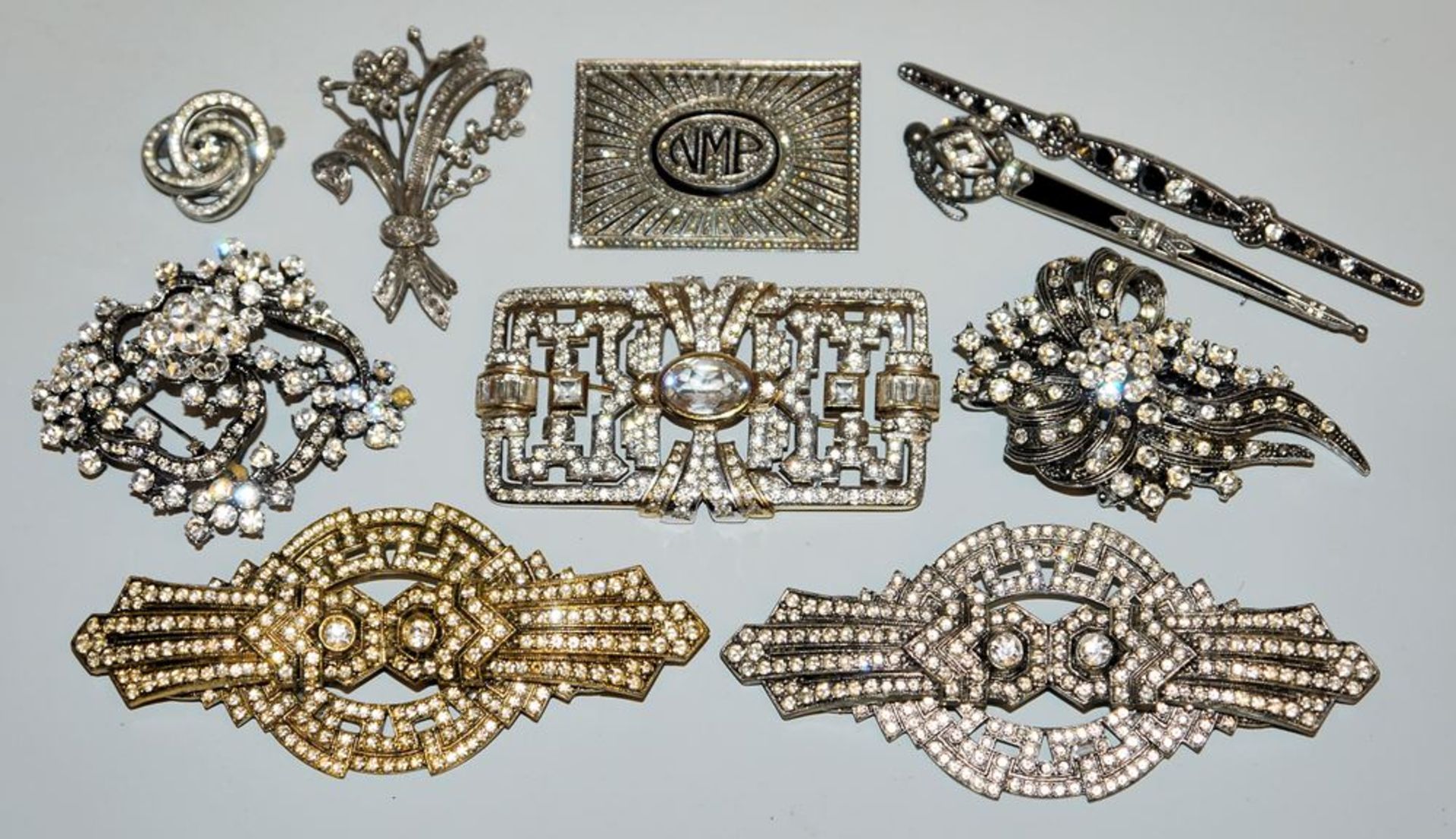 10 fine rhinestone and silver brooches from Art Deco