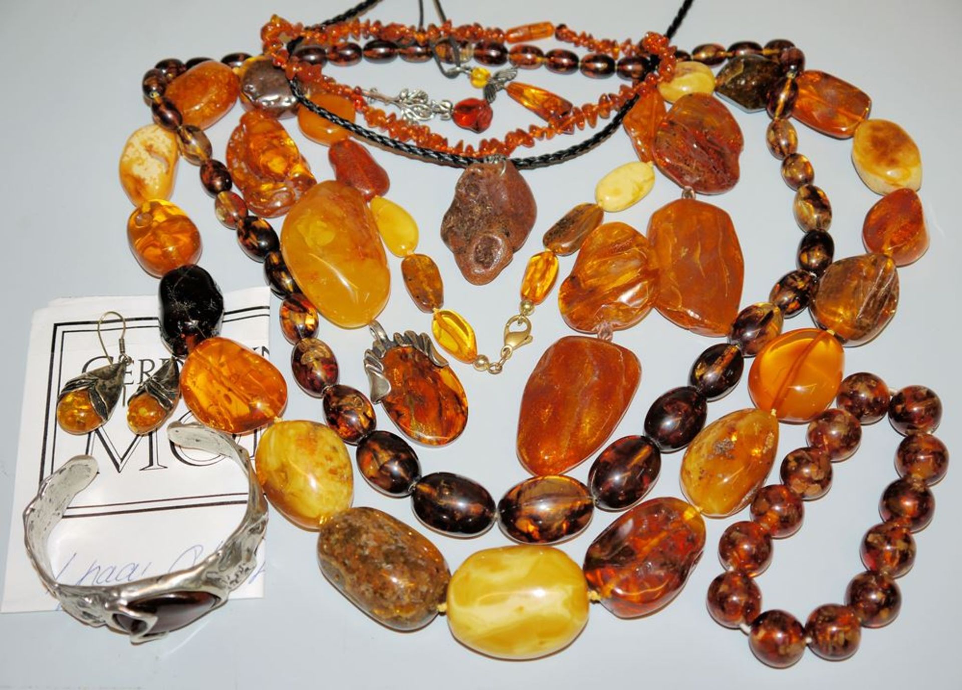 Collection of amber jewellery, silver