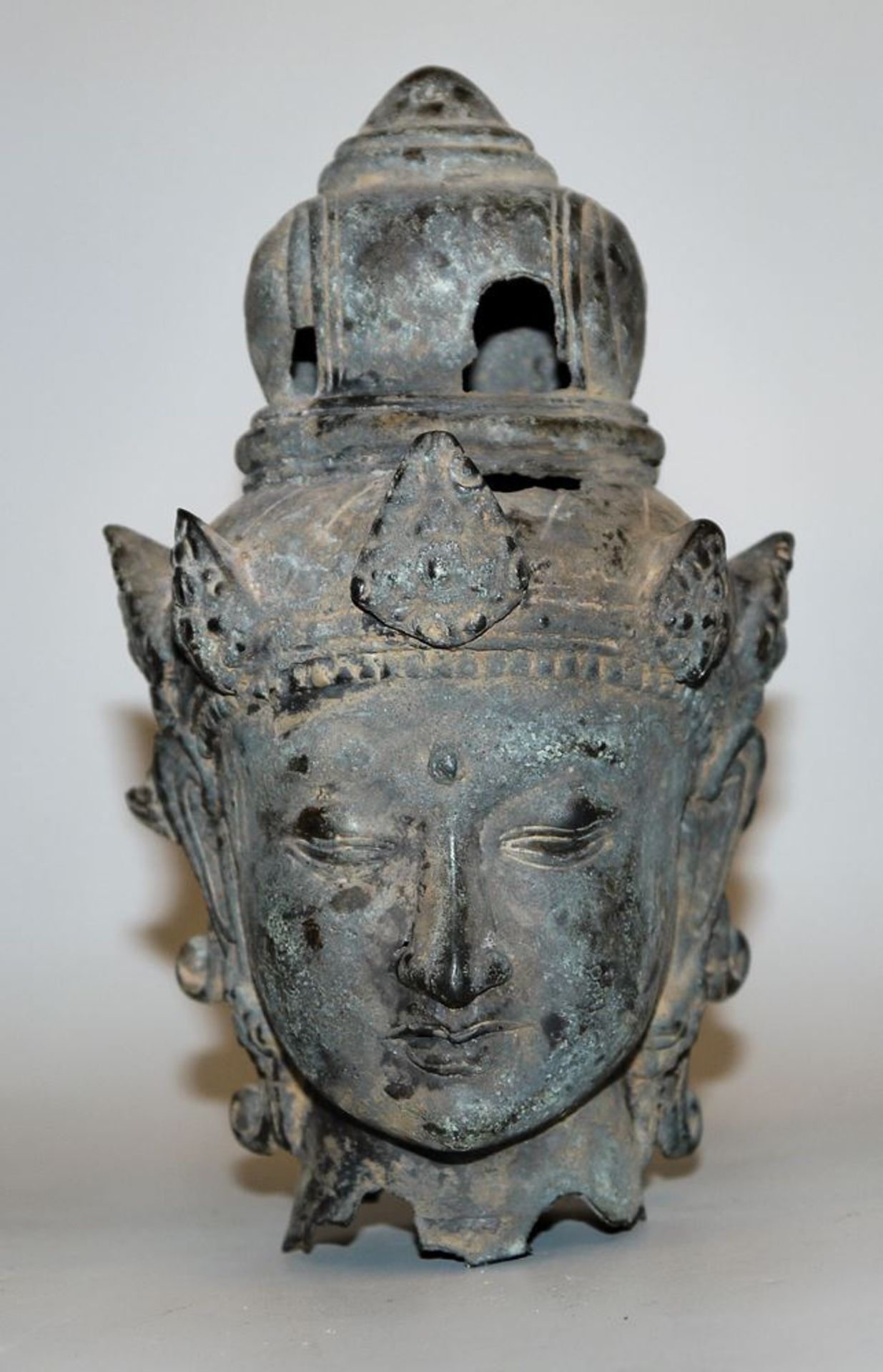 Head of a deity or a bodhisattva in Majapahit style, East Java, Indonesia