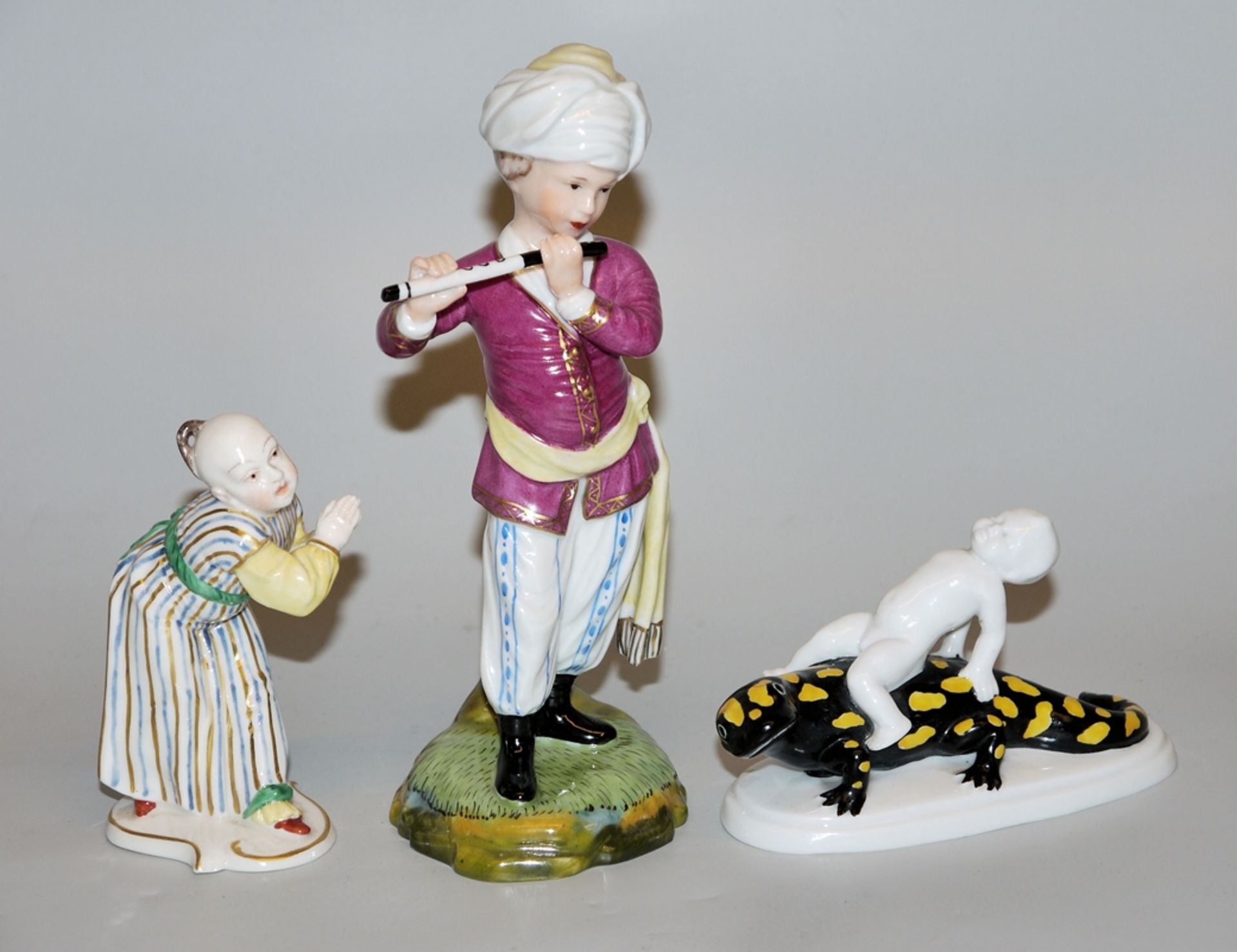 Three porcelain figures from Nymphenburg, Höchst and Fraureuth, 20th century