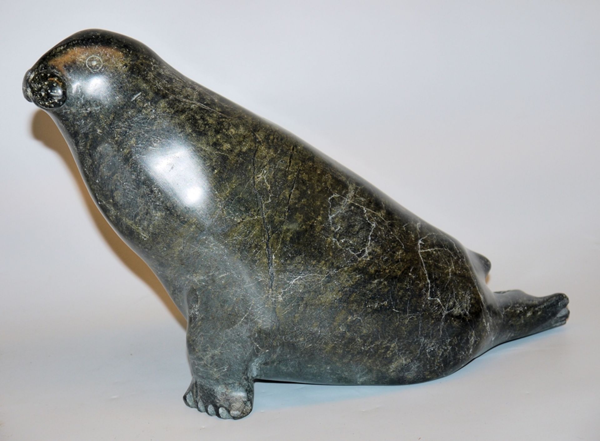 Adamee sign., Inuit sculpture of a seal made of serpentine