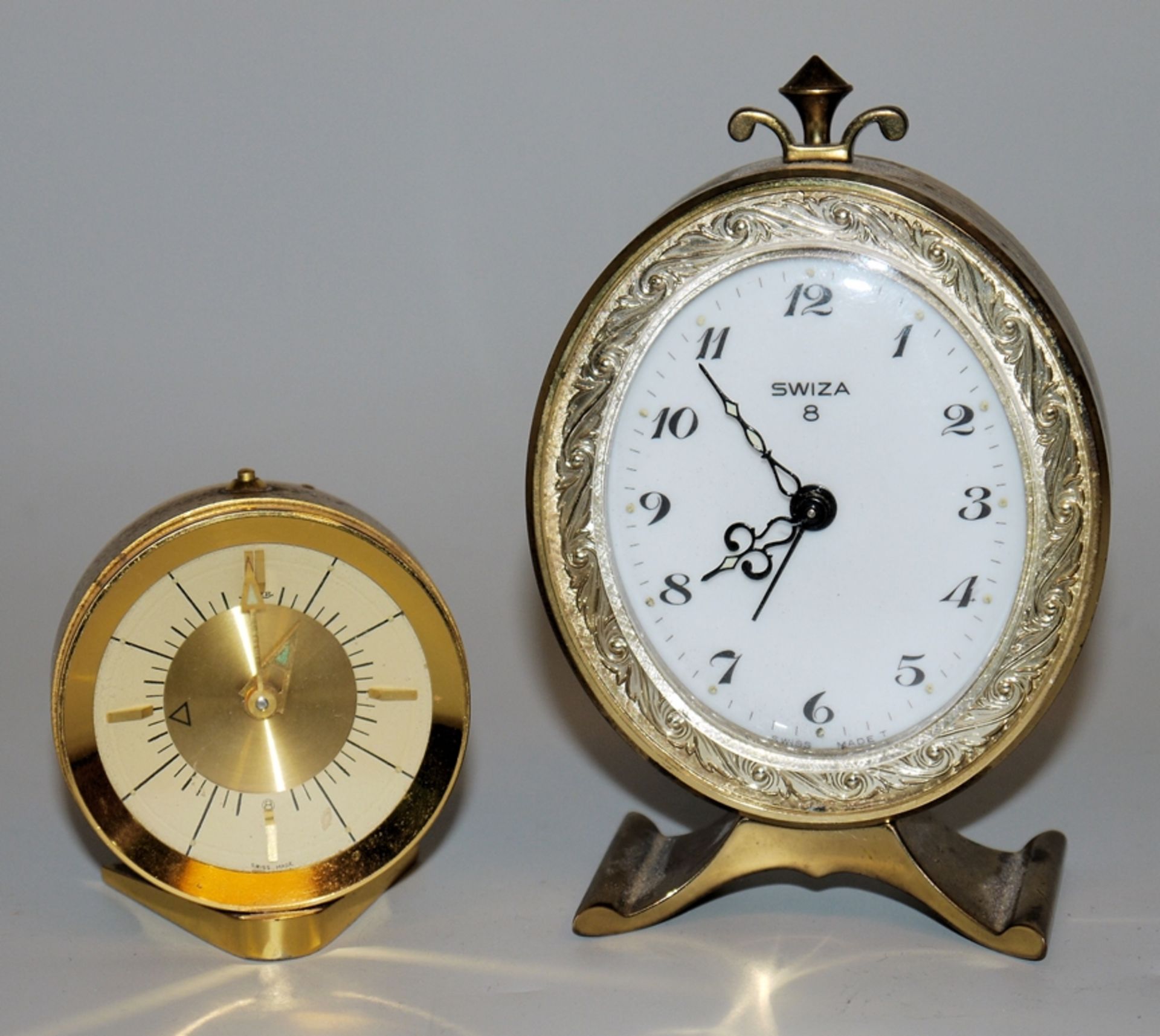 2 Table clocks with 8-day movement and alarm clock, Jaeger LeCoultre & Uti Swiza, 1960s