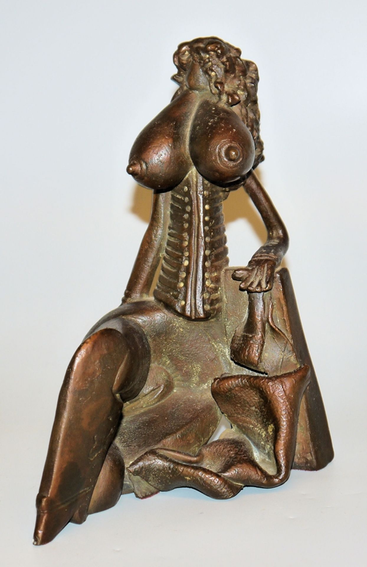 Horst Schöneich, Sitting female nude in a corset, bronze sculpture