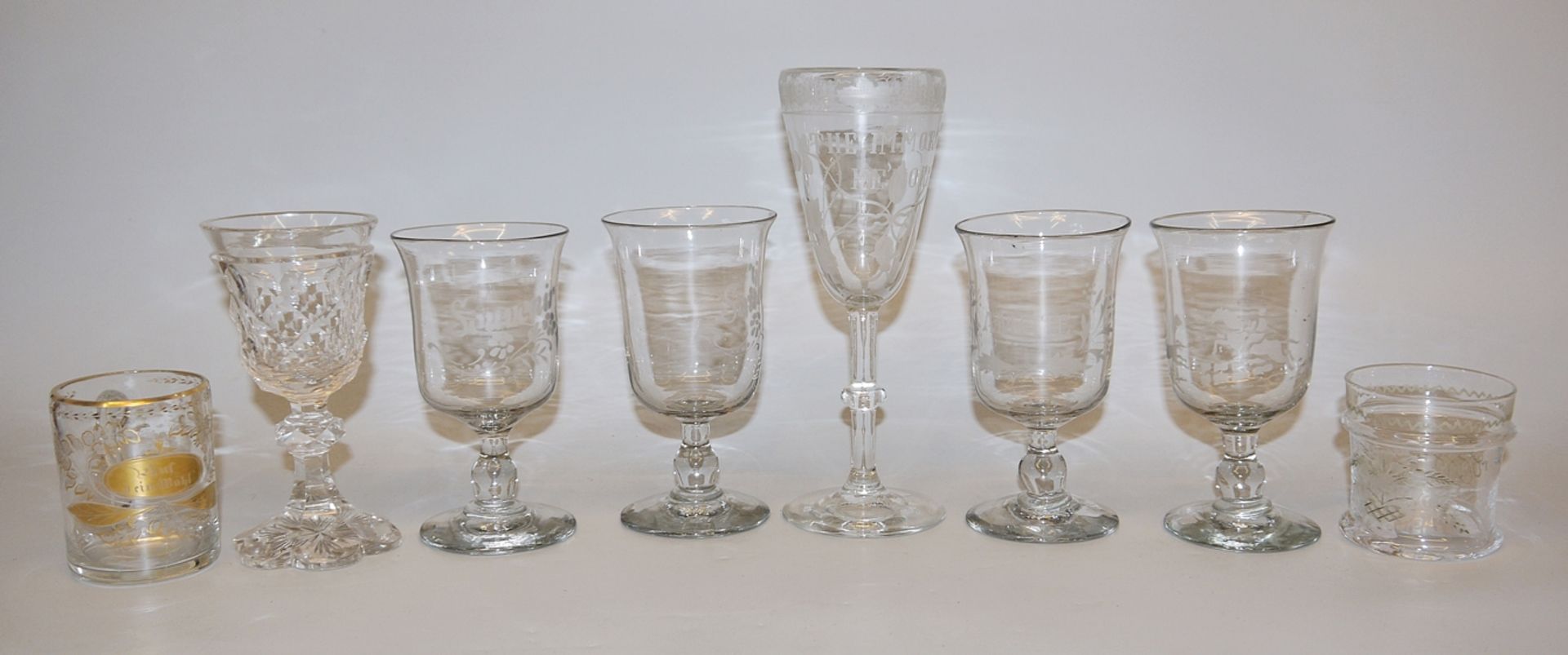 Eight 19th century drinking glasses of colourless glass
