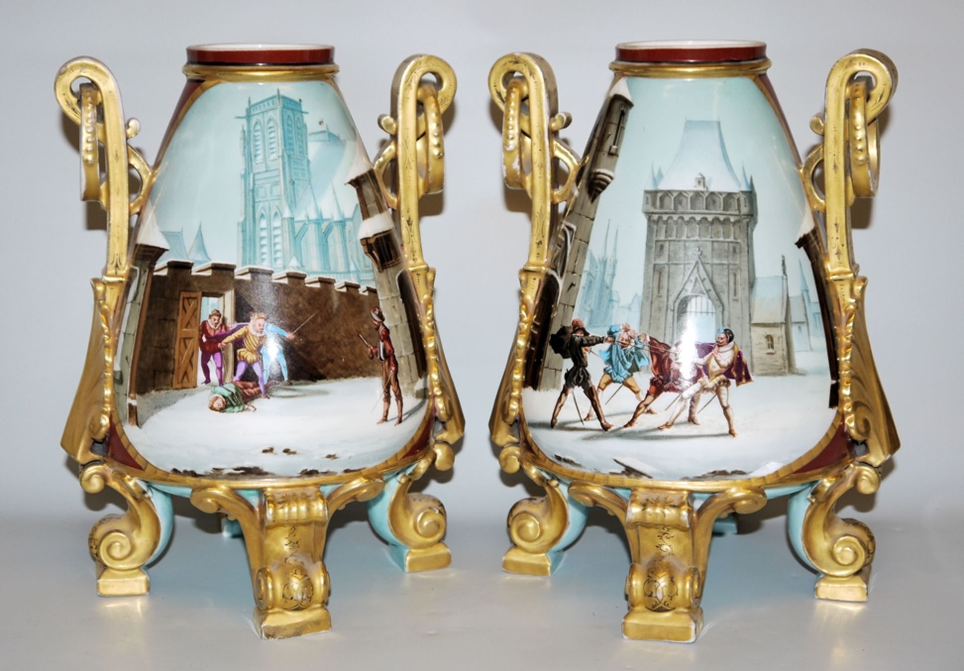 Pair of Historicist porcelain vases with battle scenes in front of Gothic architecture, France, 2nd