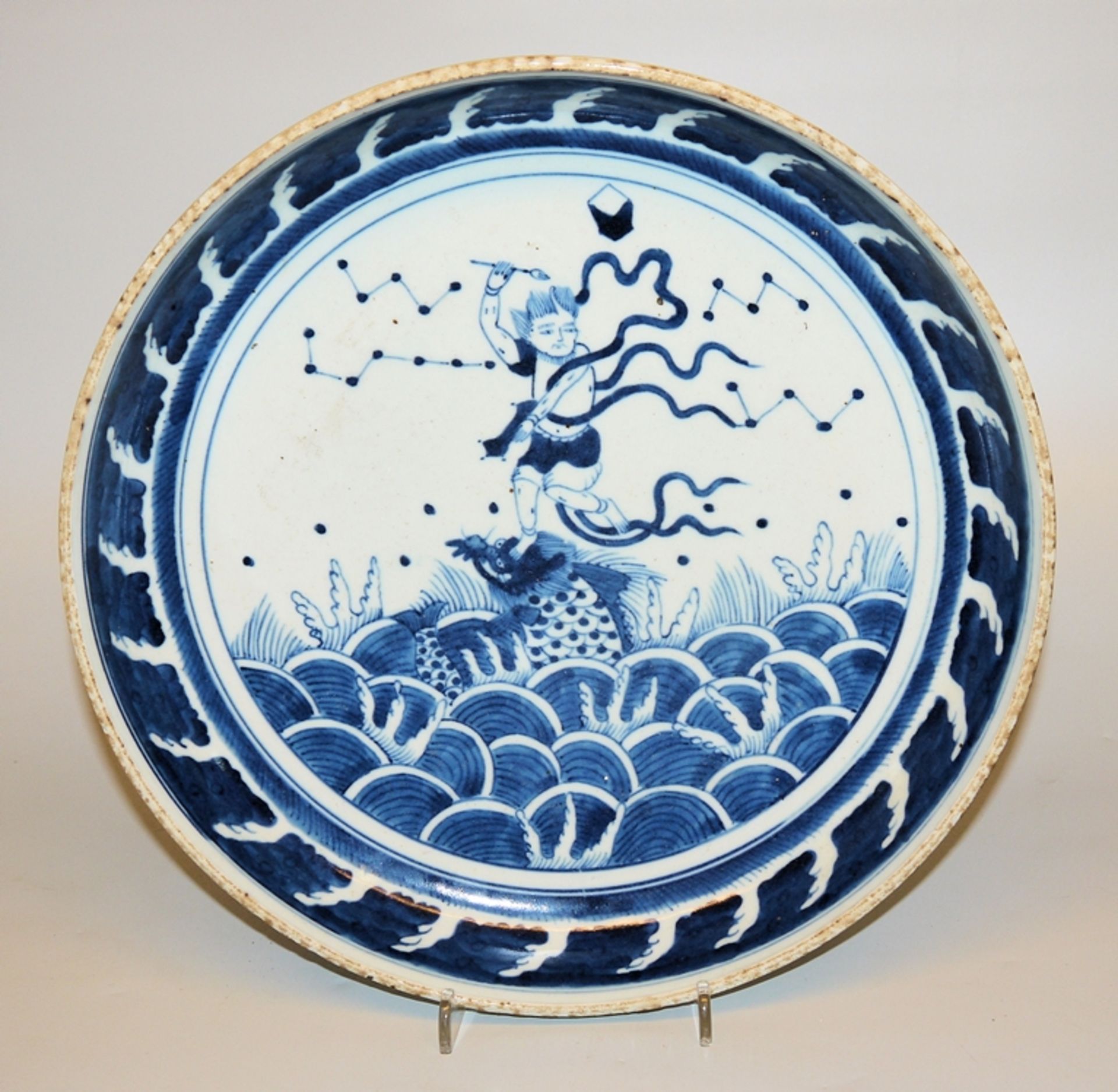 Blue and white plate with the Immortal Kui Xing, Qing period, China 19th c.