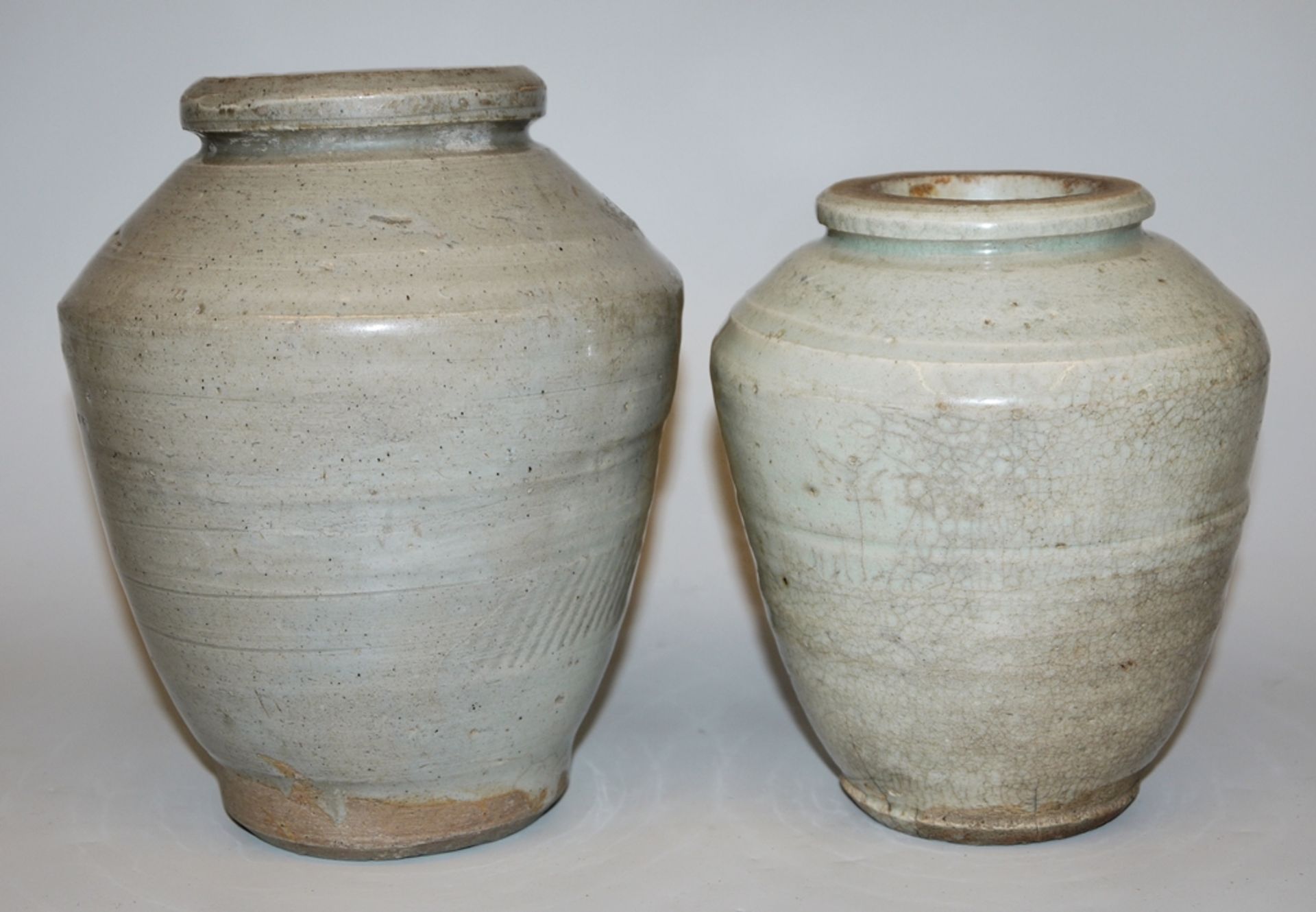 Two celadon storage jars, Ming period, probably southern China 16th/17th century