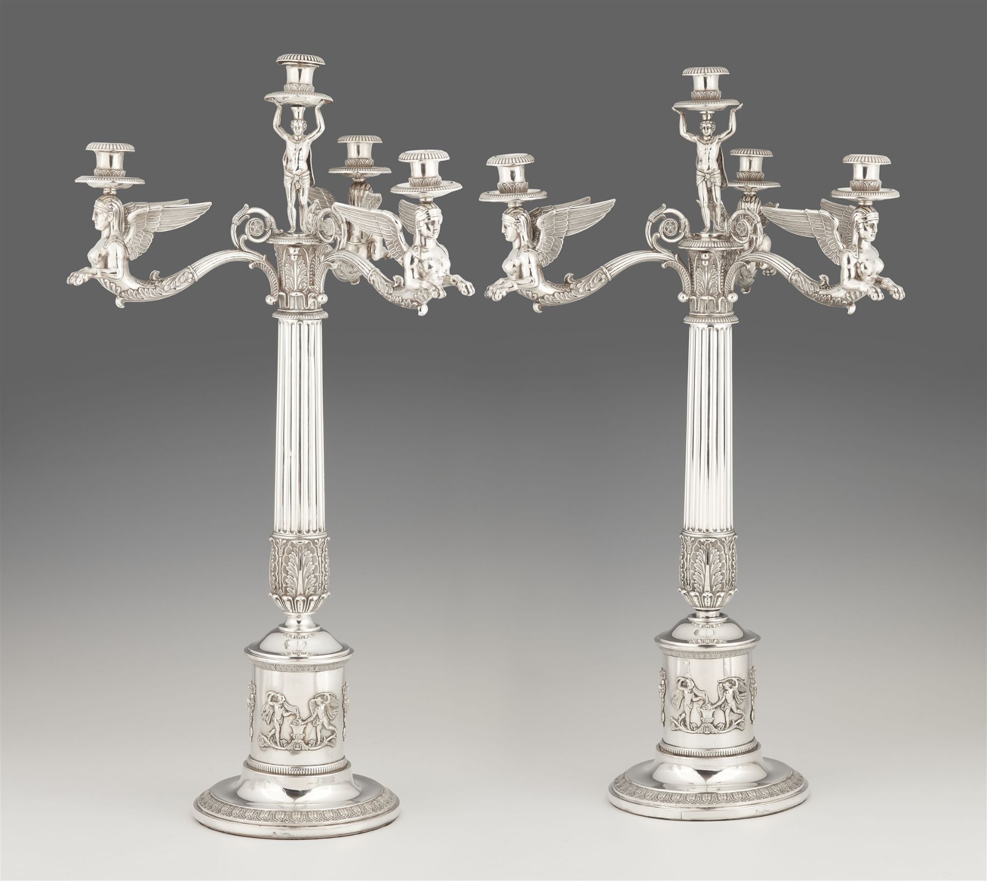 A pair of large Empire Berlin silver candelabra