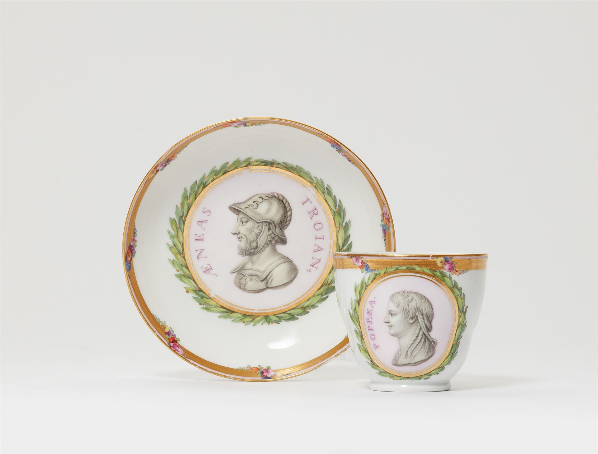 A Berlin KPM porcelain cup with Poppaea and saucer with Aeneas