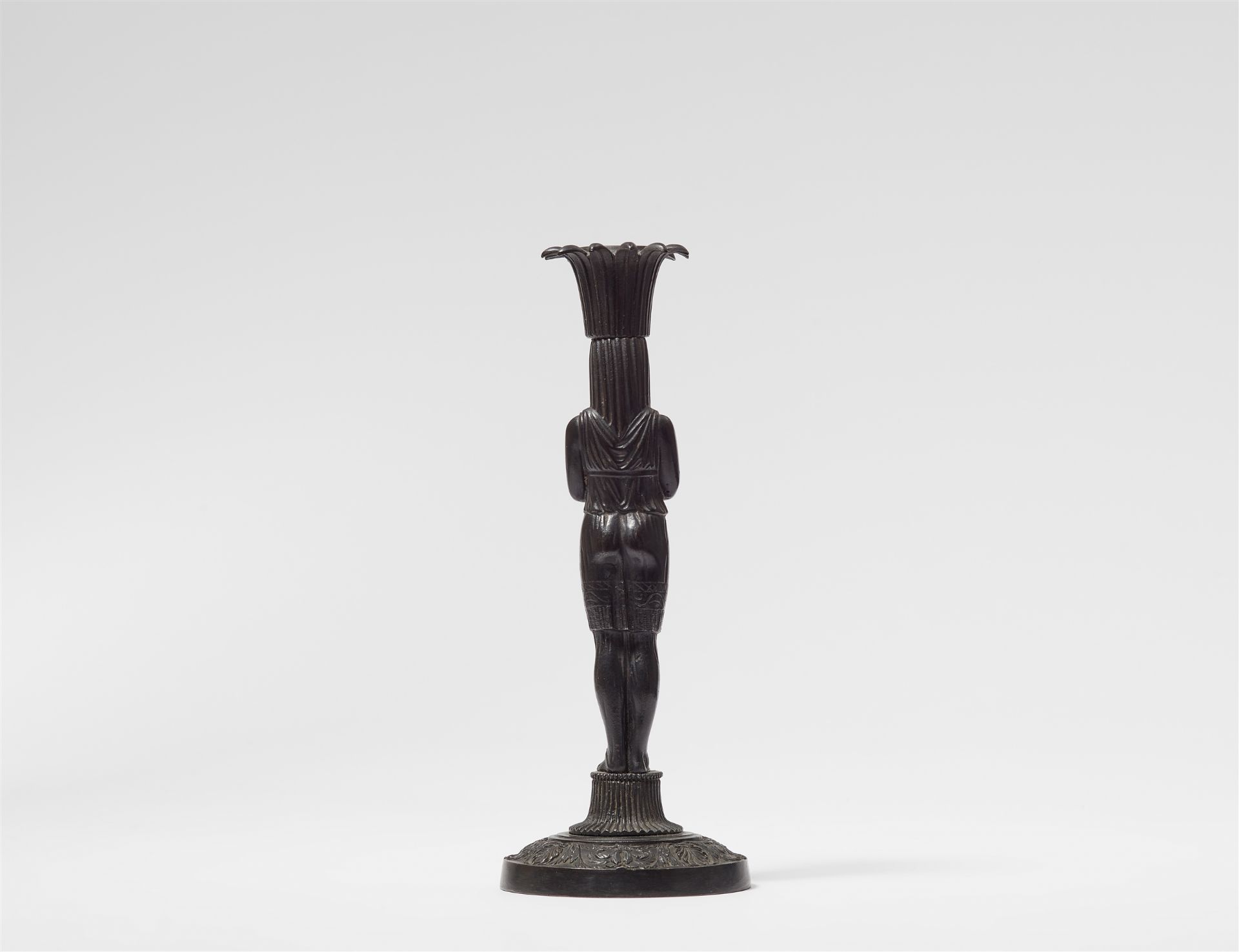 A cast iron candlestick formed as an Egyptian lady - Image 2 of 2