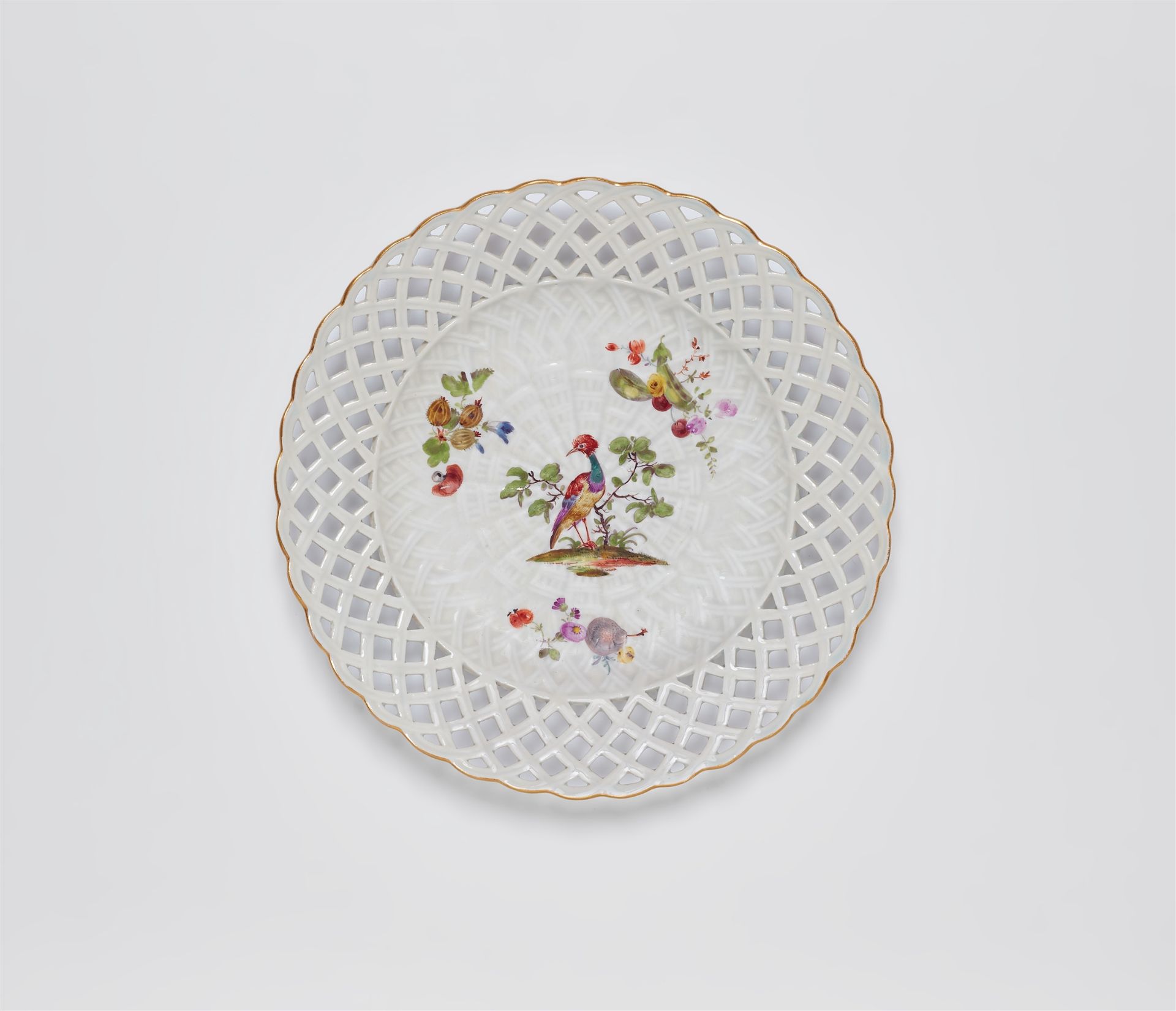 A Meissen porcelain dessert plate from a service for King Frederick II with Indian birds, fruit and 