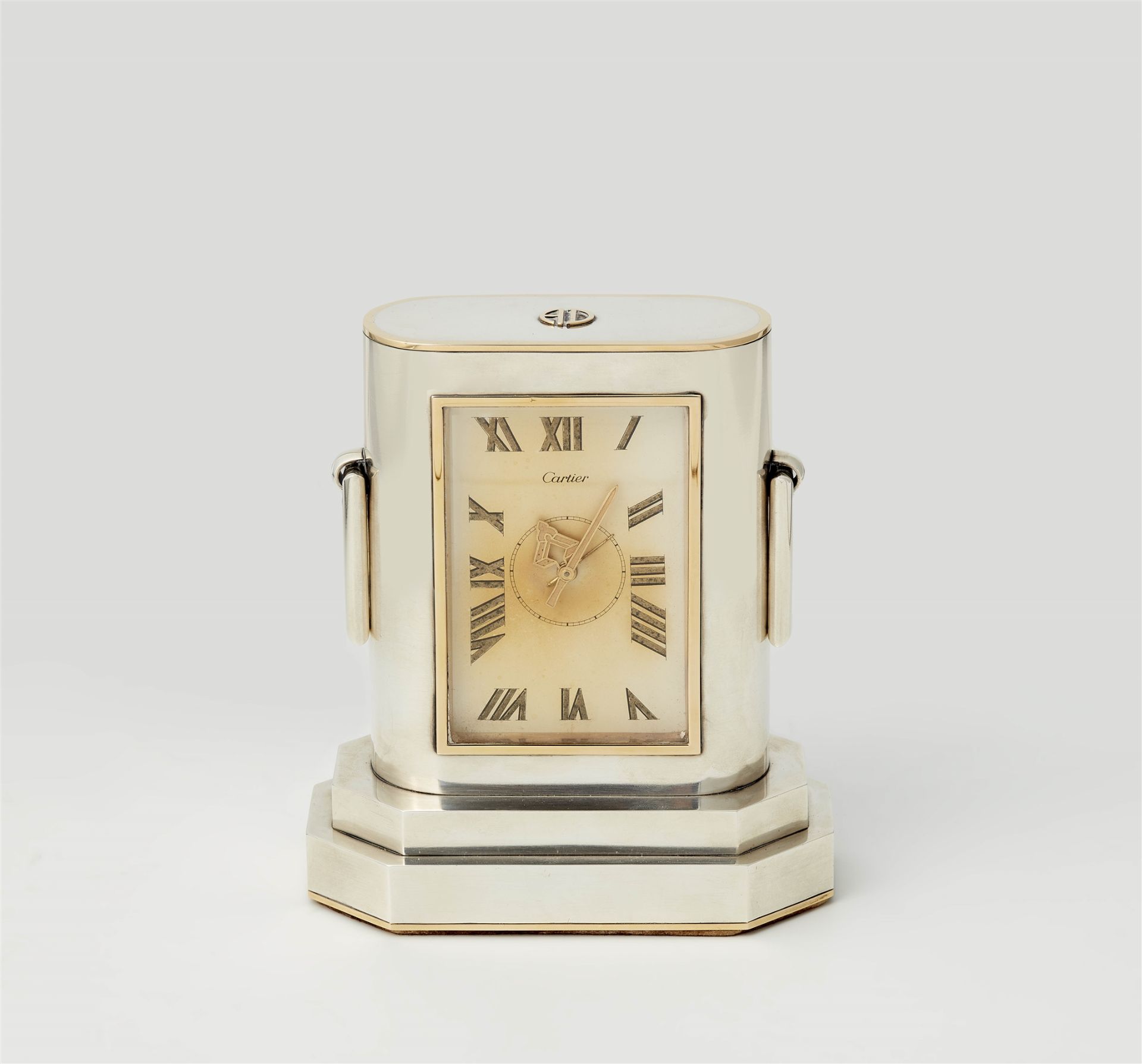 An Art Déco white metal Cartier table clock.