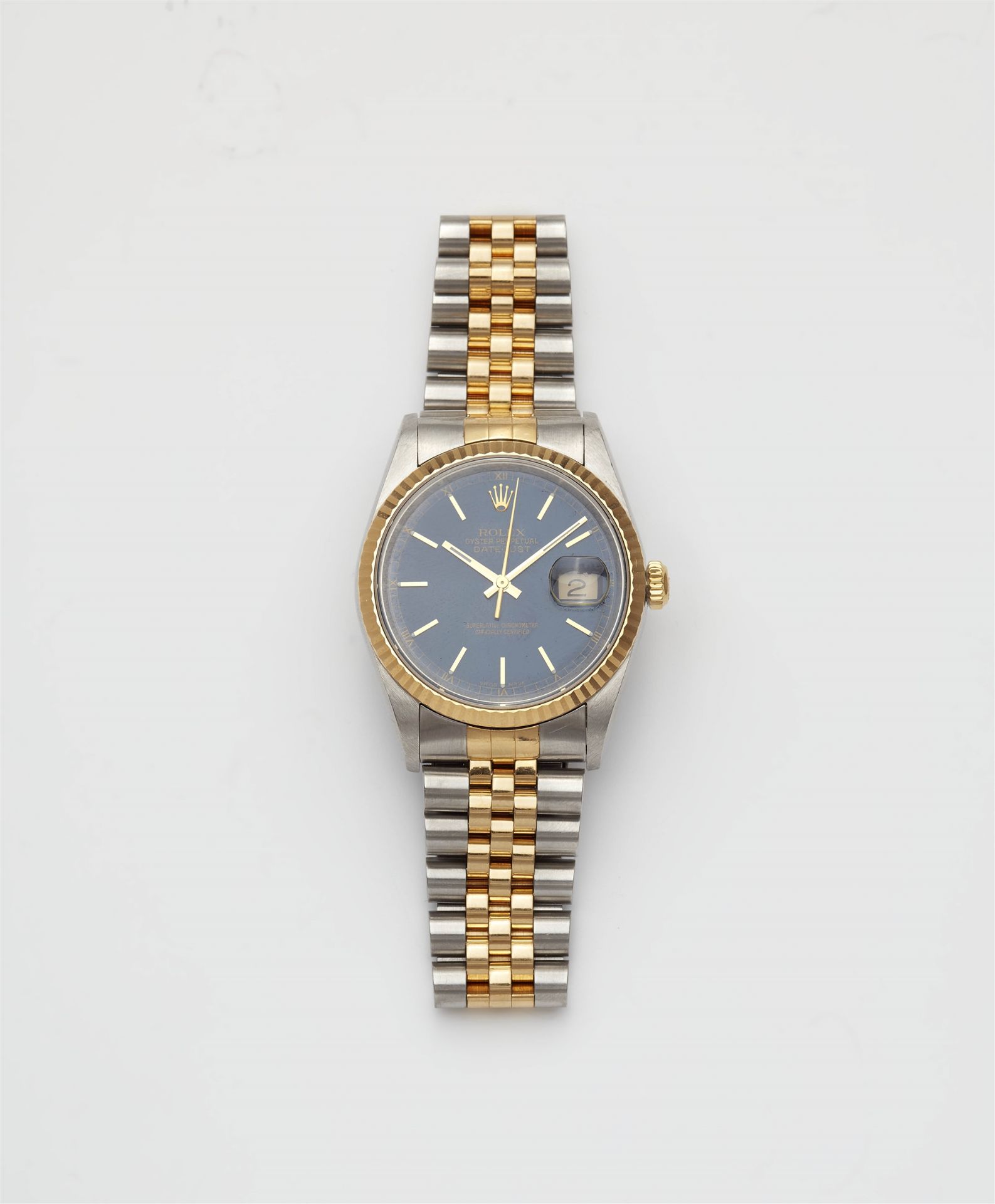 An 18k yellow gold and stainless steel automatic Rolex datejust gentleman's wristwatch.