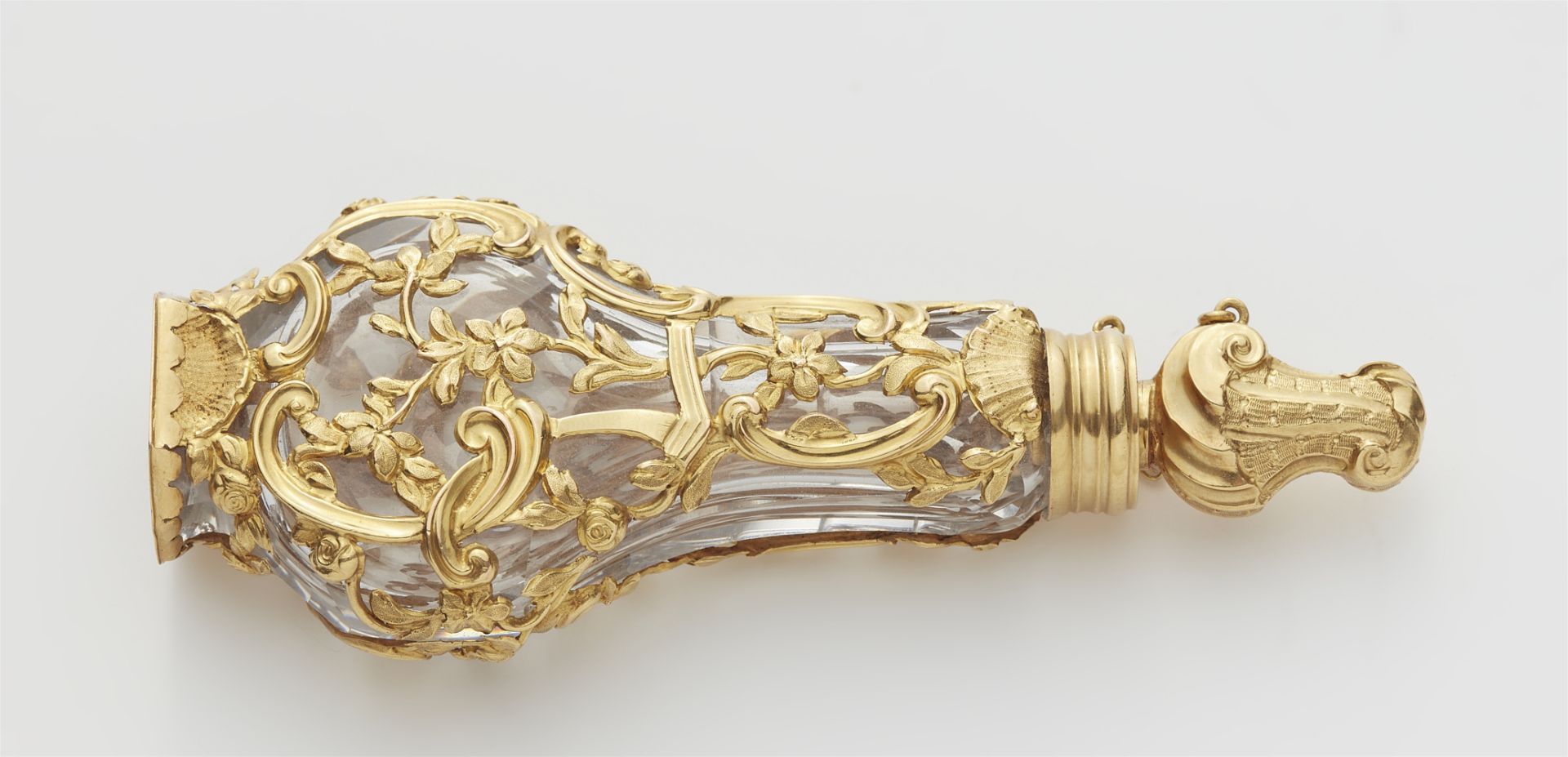 A George III rock crystal and 18k gold cage work scent flask with rocaille stopper. - Image 2 of 2