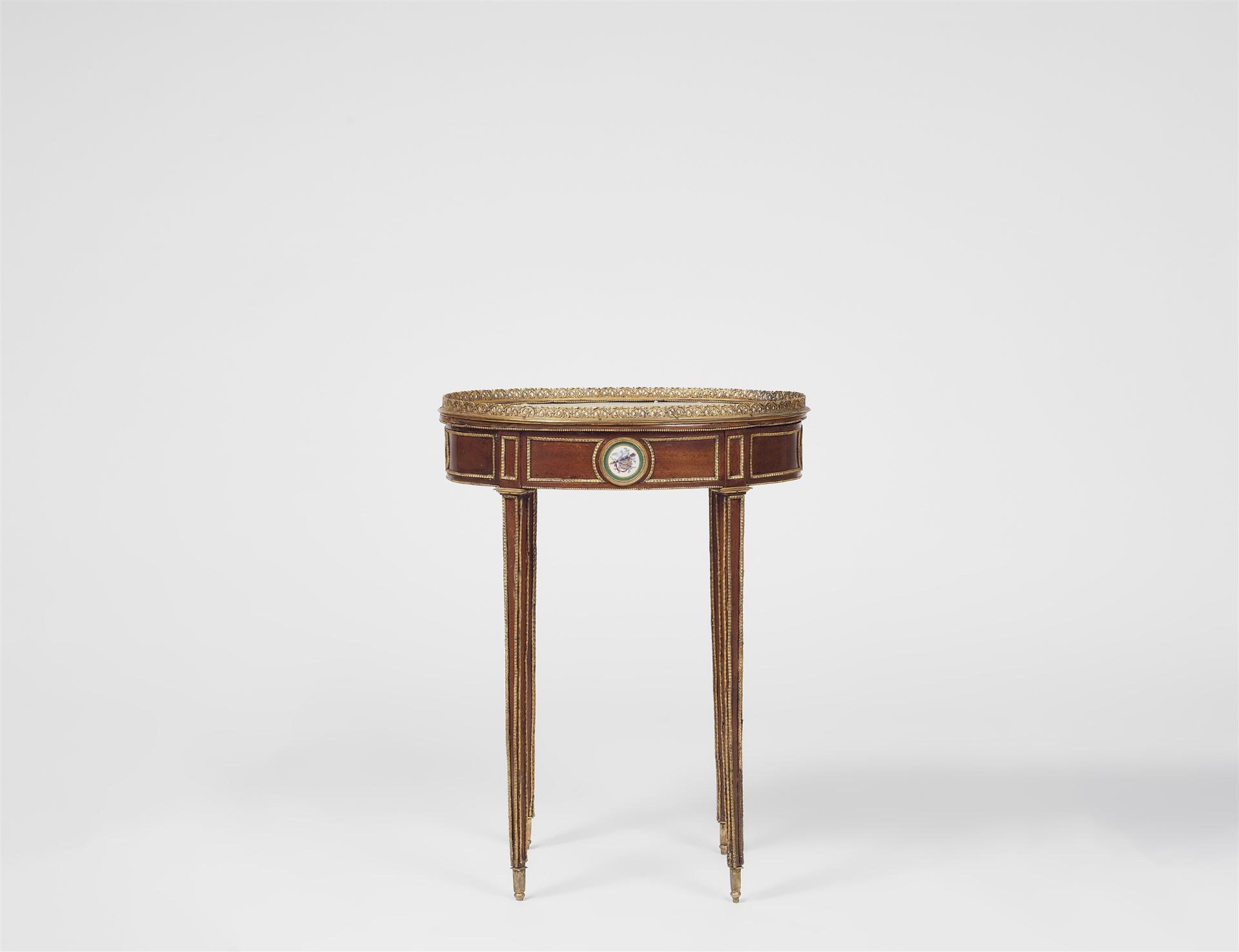 A Louis XVI style table