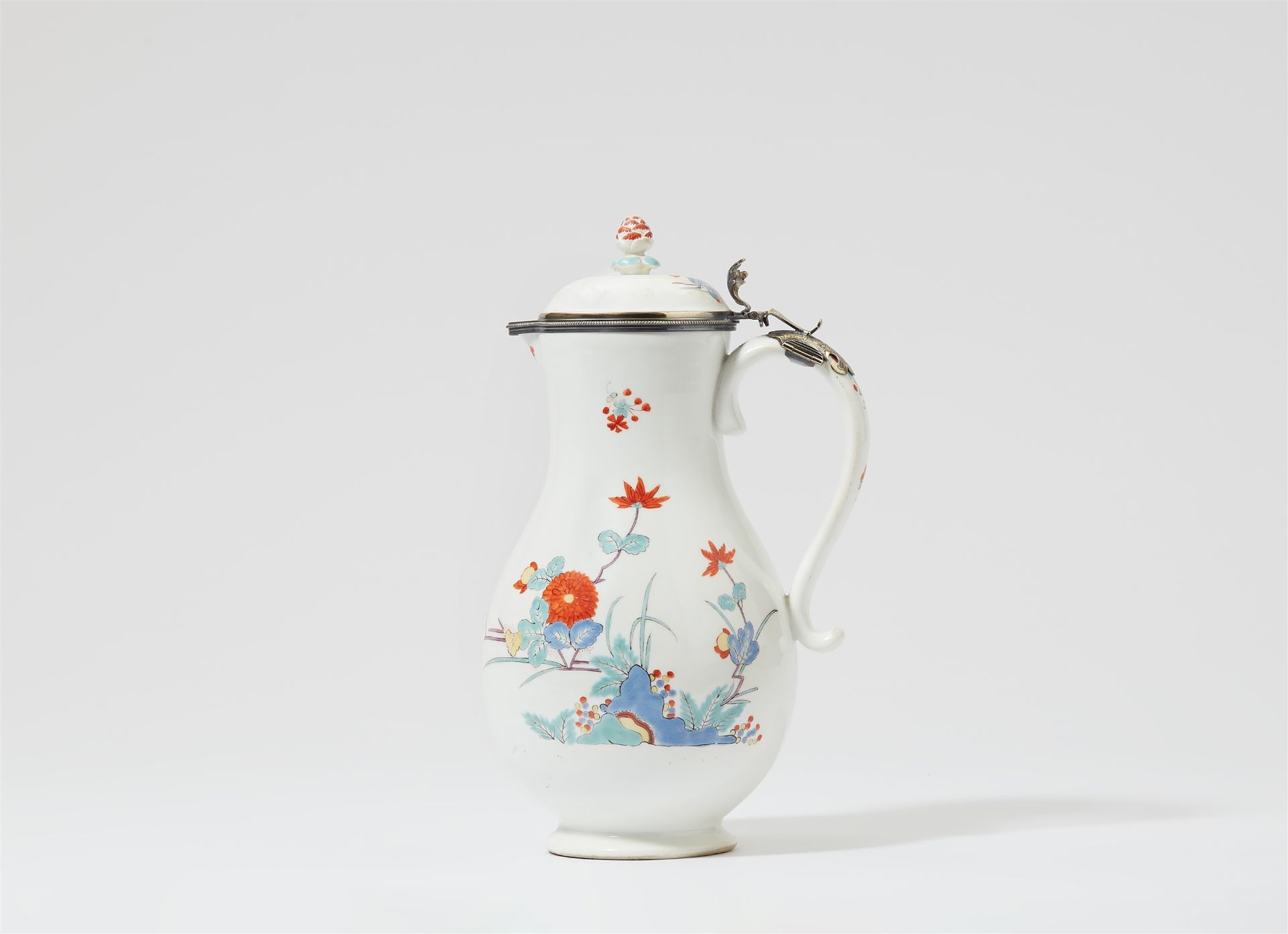 A Meissen porcelain jug with chrysanthemum motifs