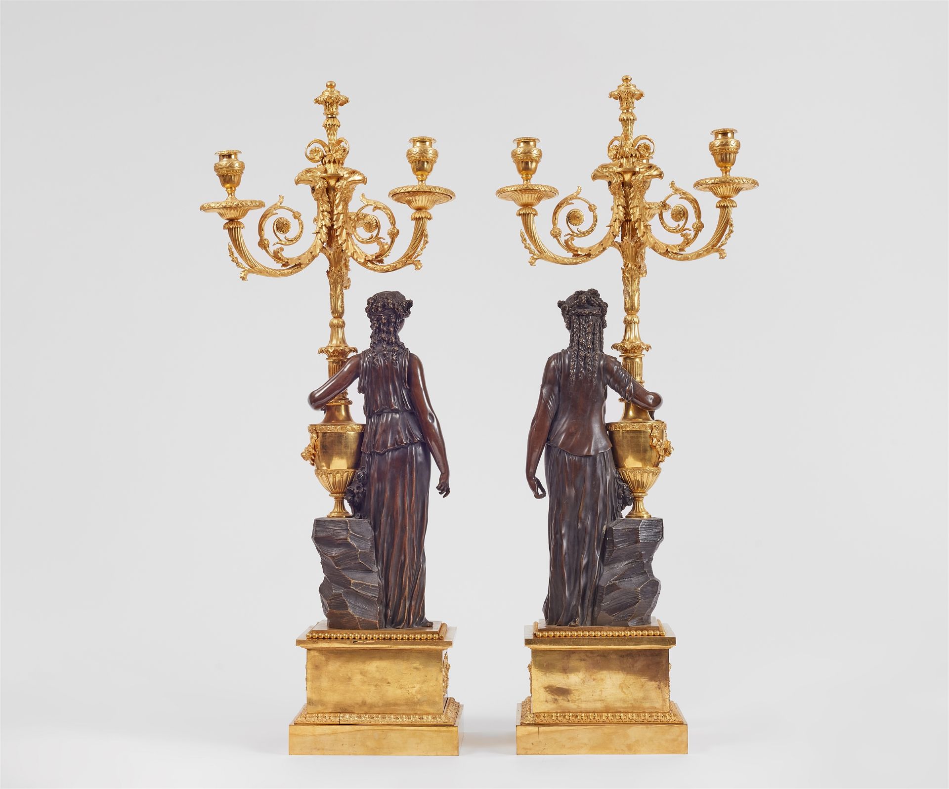 A pair of sculptural ormolu candelabra, after a model by Clodion - Image 2 of 2