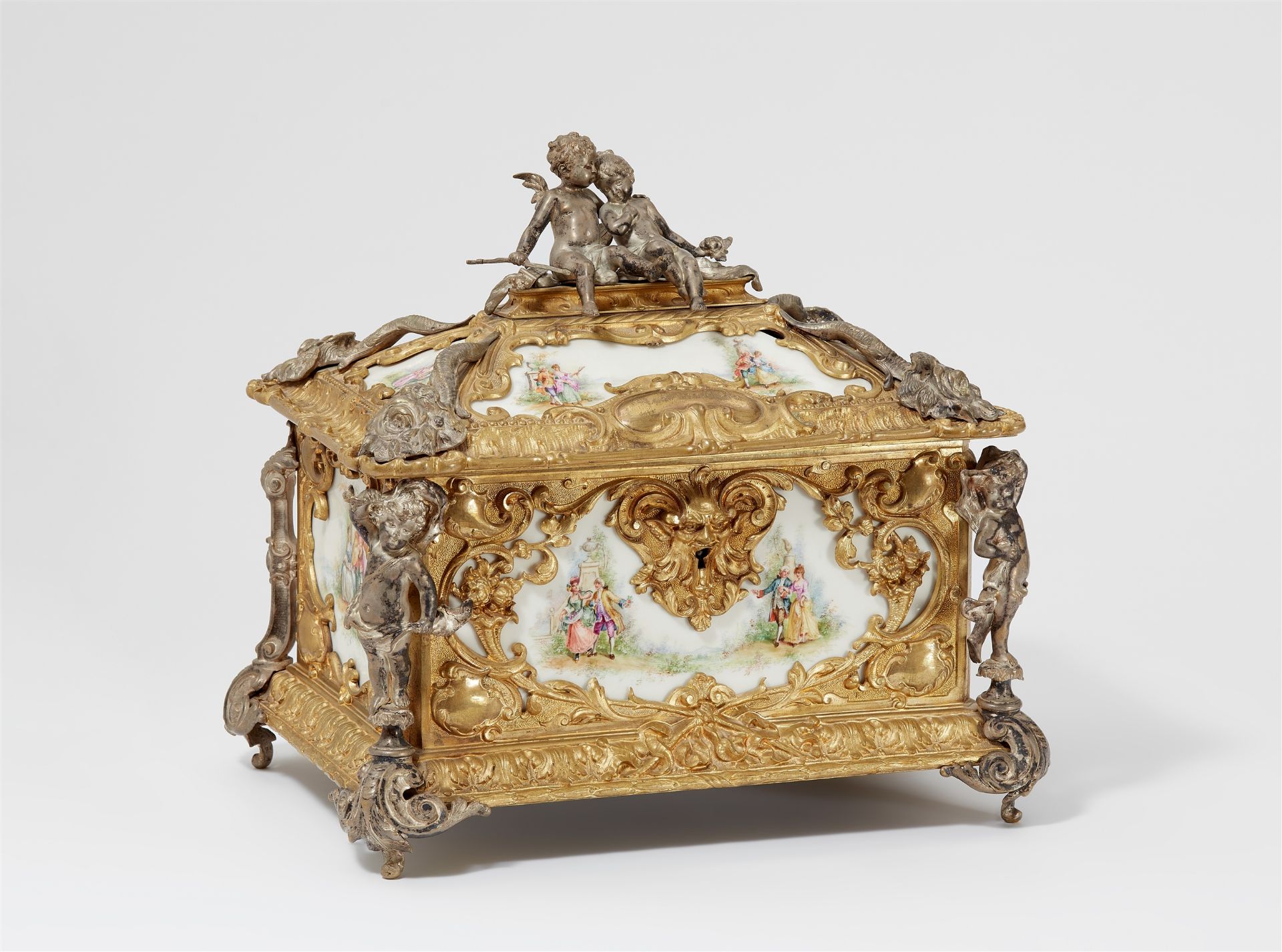 An opulent gilt bronze casket with allegories of love