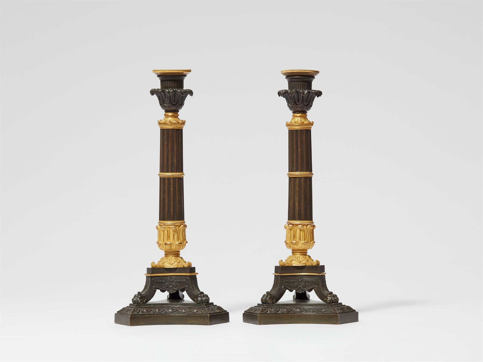 A pair of Parisian ormolu candlesticks