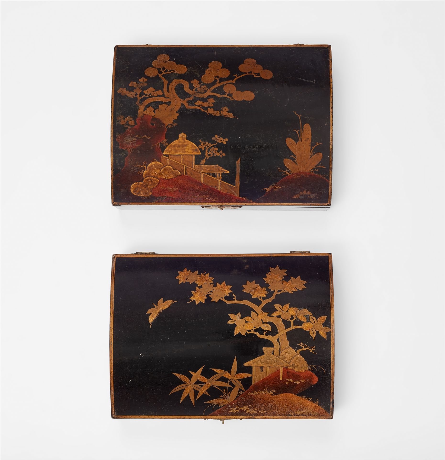 A pair of Japanese style lacquer wig cases