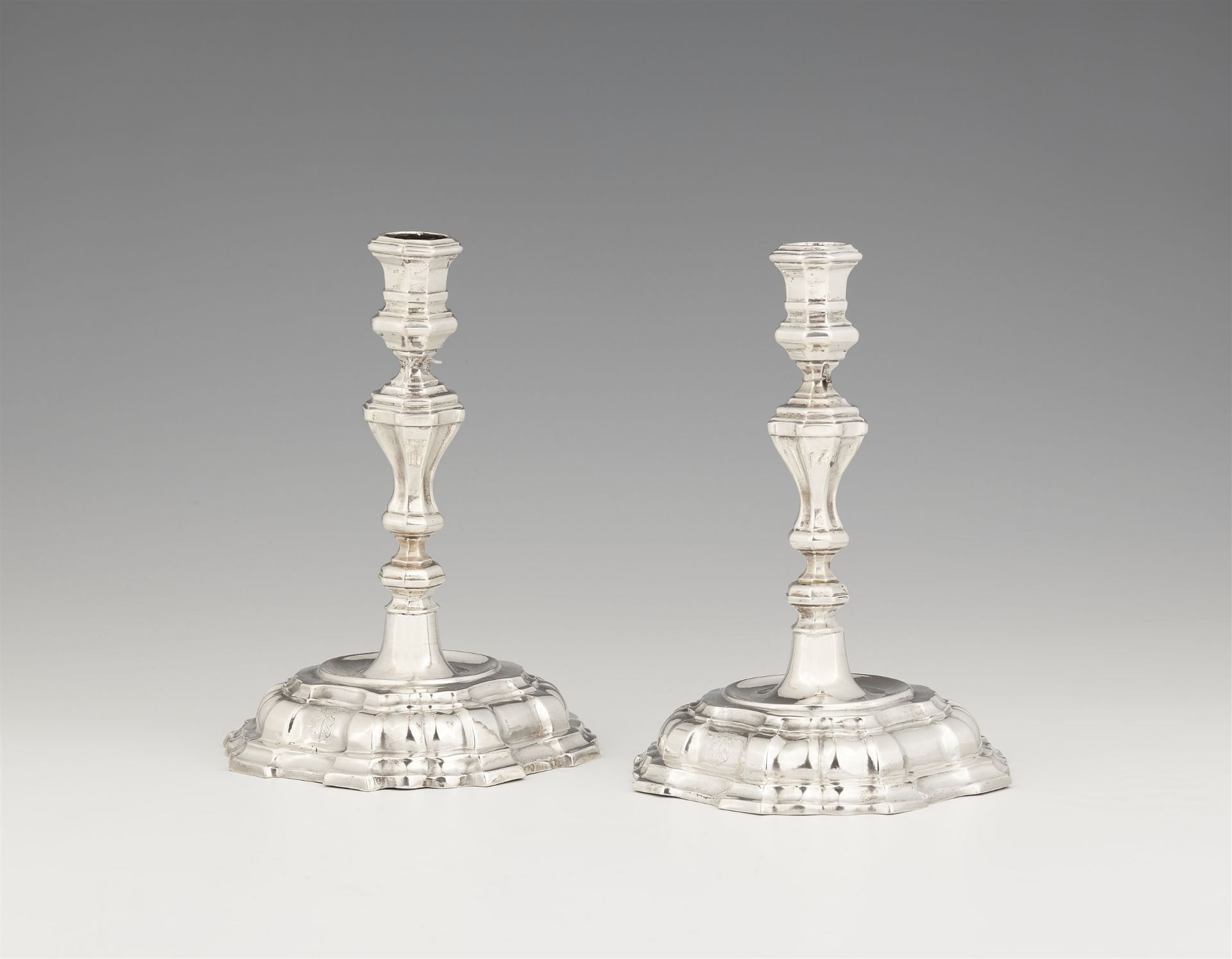 A pair of Augsburg silver candlesticks