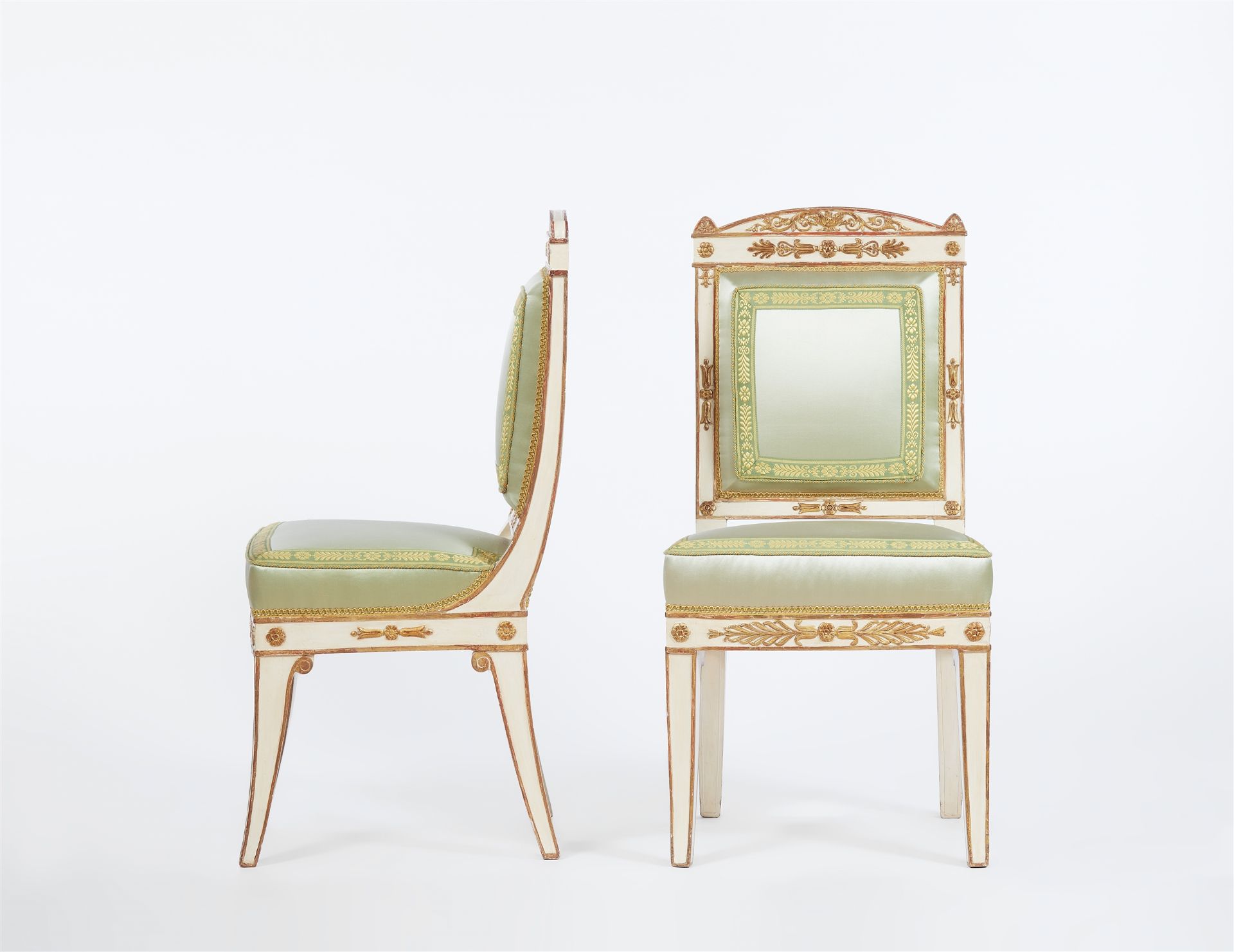 A pair of French Empire chairs