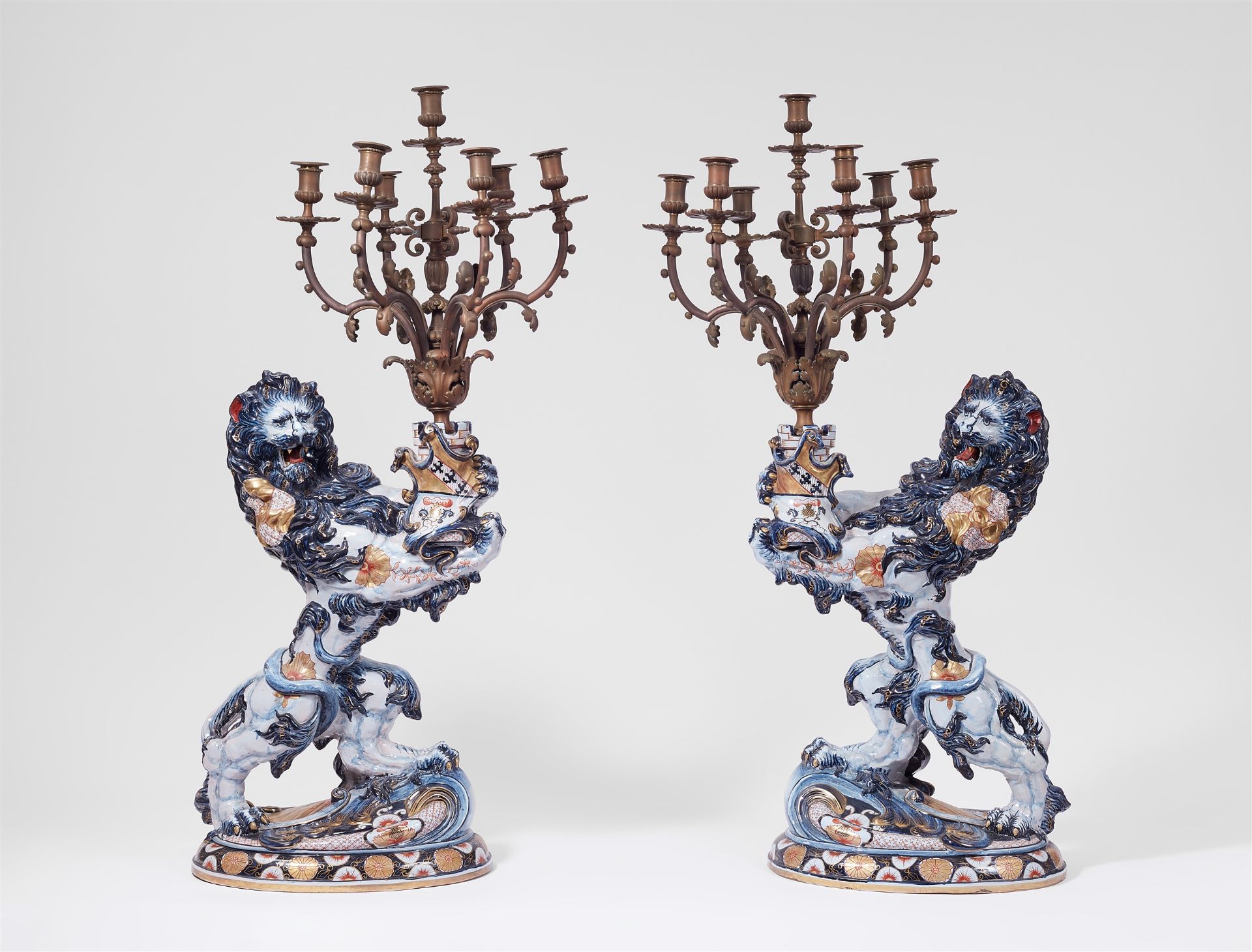 A pair of lion candelabra, large models, by Emile Gallé