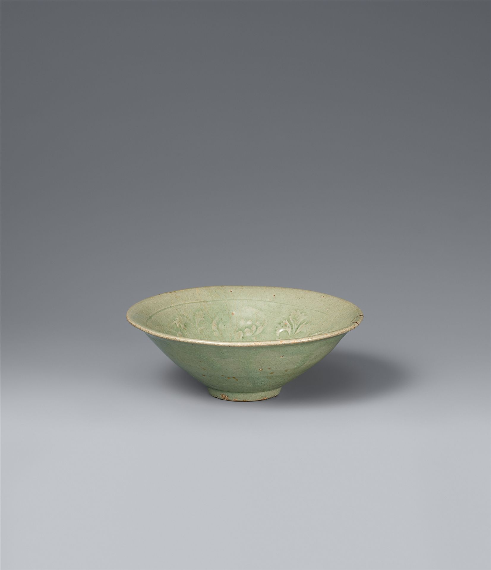 A carved celadon bowl. Korea. Goryeo dynasty, 12th/13th century