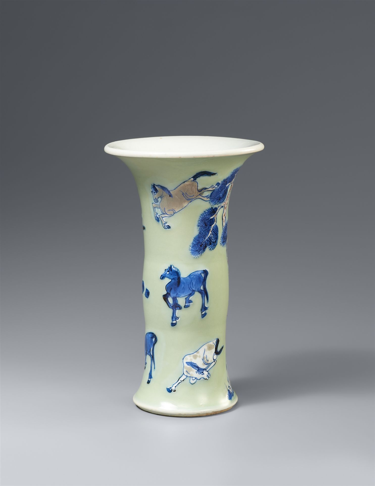 A small celadon-ground gu-shaped vase. Kangxi period (1662 - 1722)