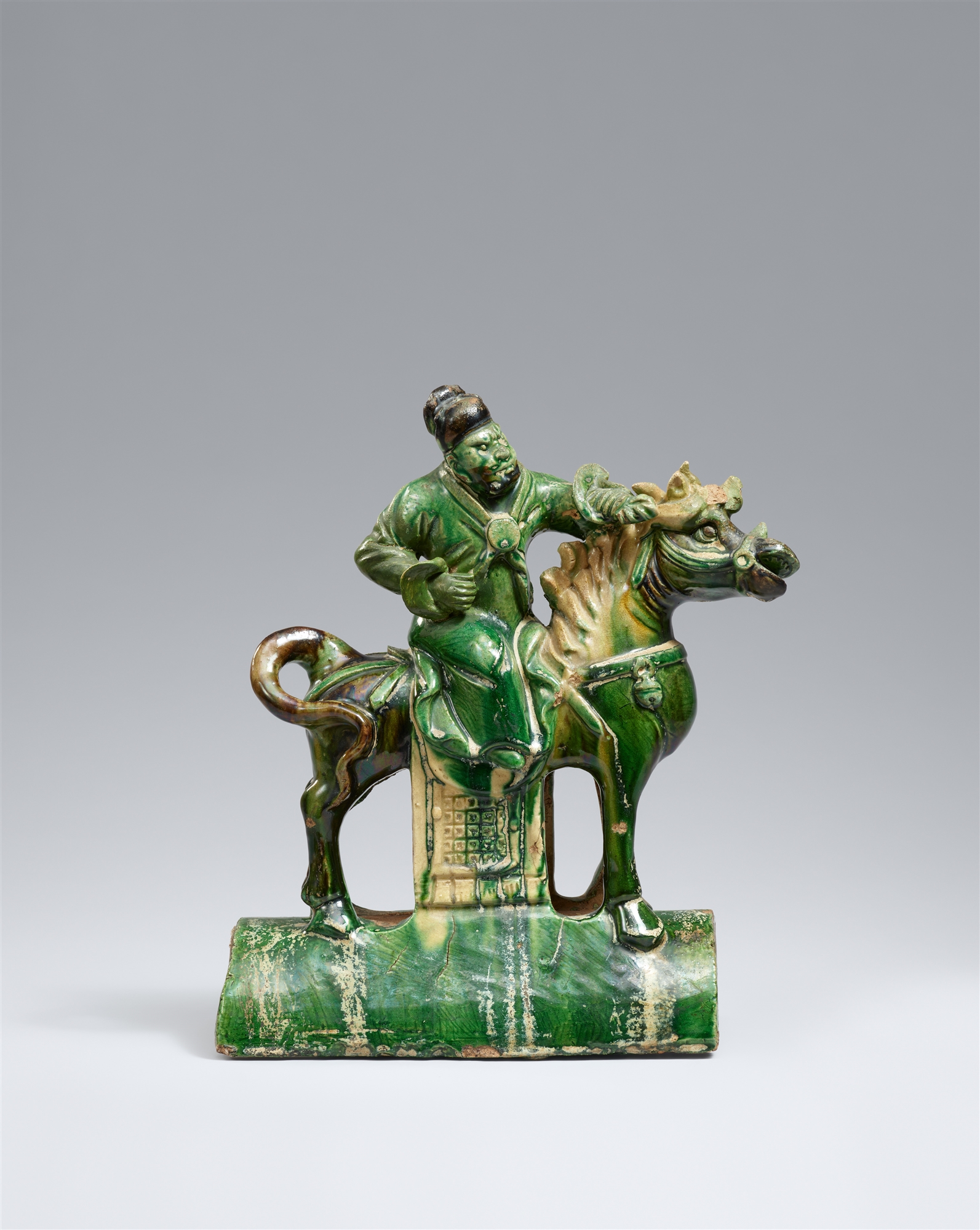 A sancai-glazed horseman rooftile. Ming dynasty, 16th/17th century