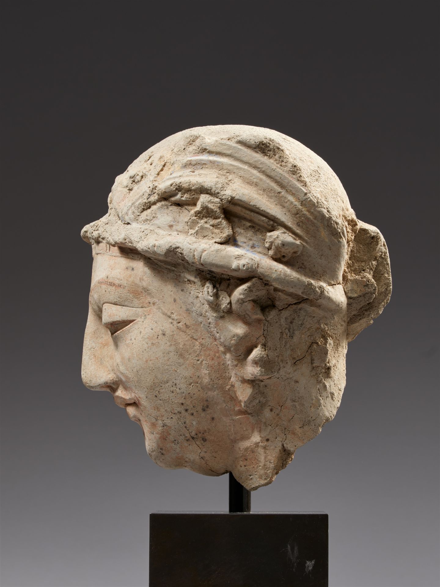 A Gandhara stucco head of a bodhisattva. Pakistan/Afghanistan. 2nd/3rd century - Image 2 of 3