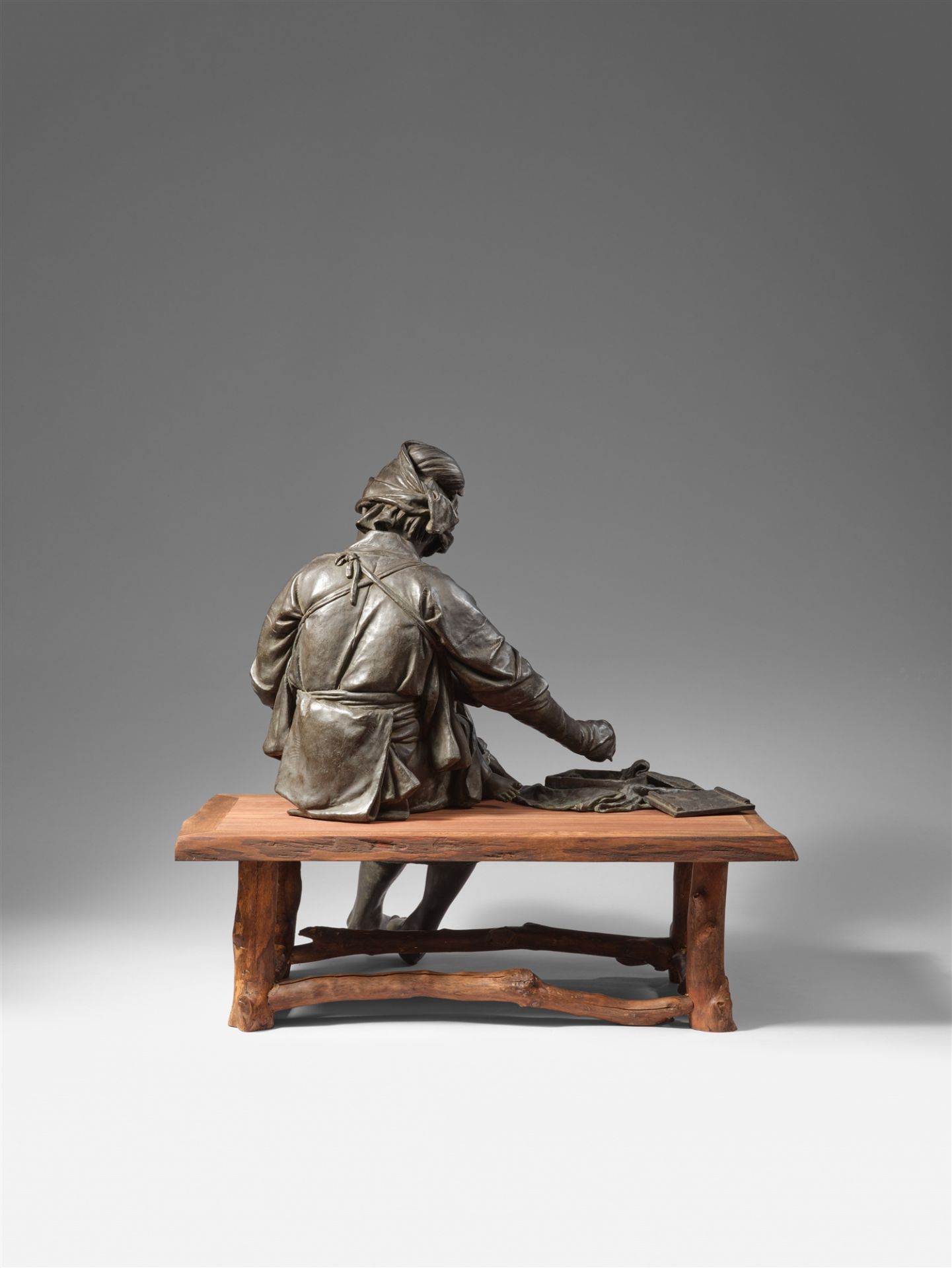 An Udagawa Kazuo cast bronze figure of a young mother with her child, seated on a wooden bench. Toky - Image 2 of 4