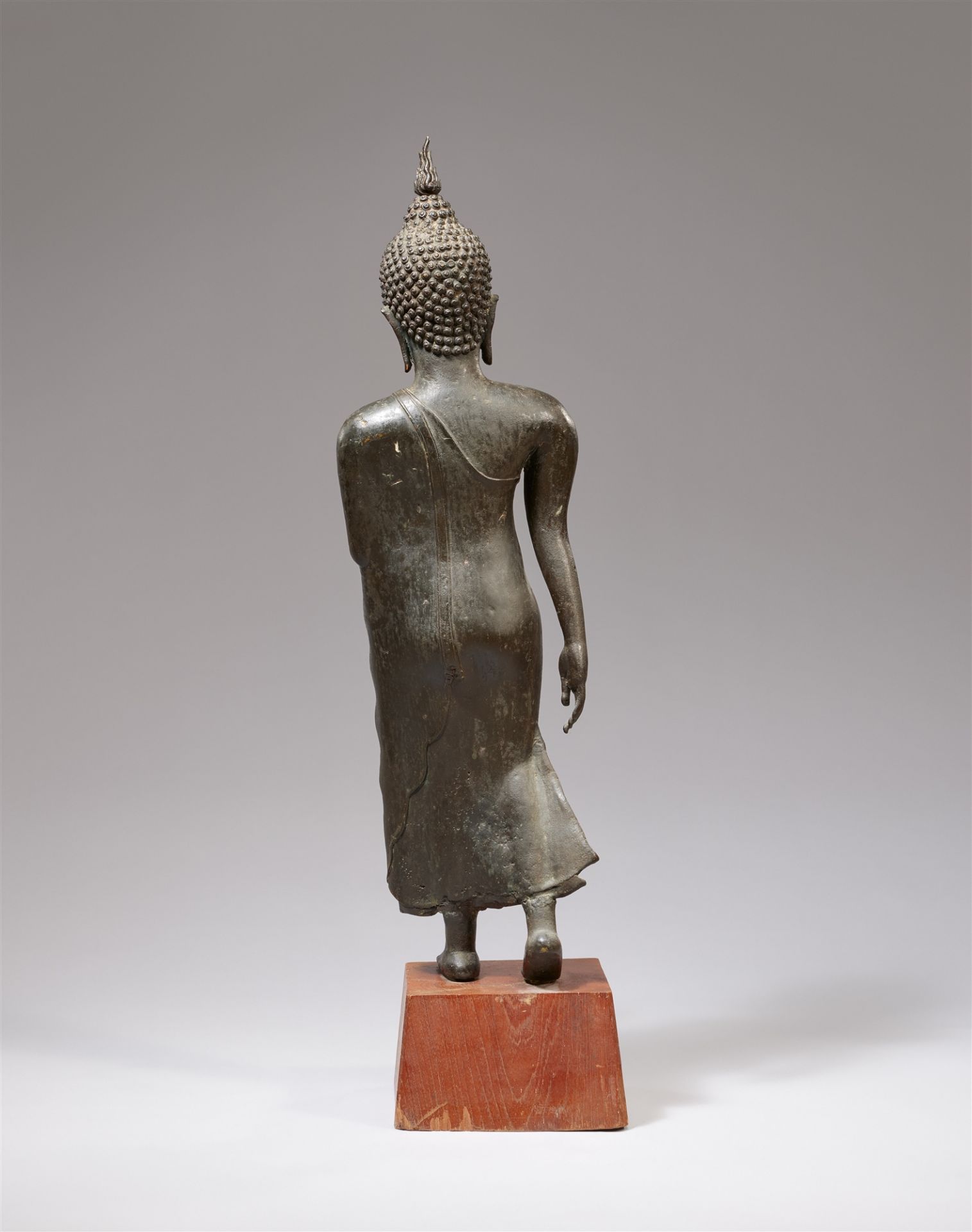 A Sukhothai-style bronze figure of a walking Buddha. Thailand. 14th century or later - Image 2 of 2