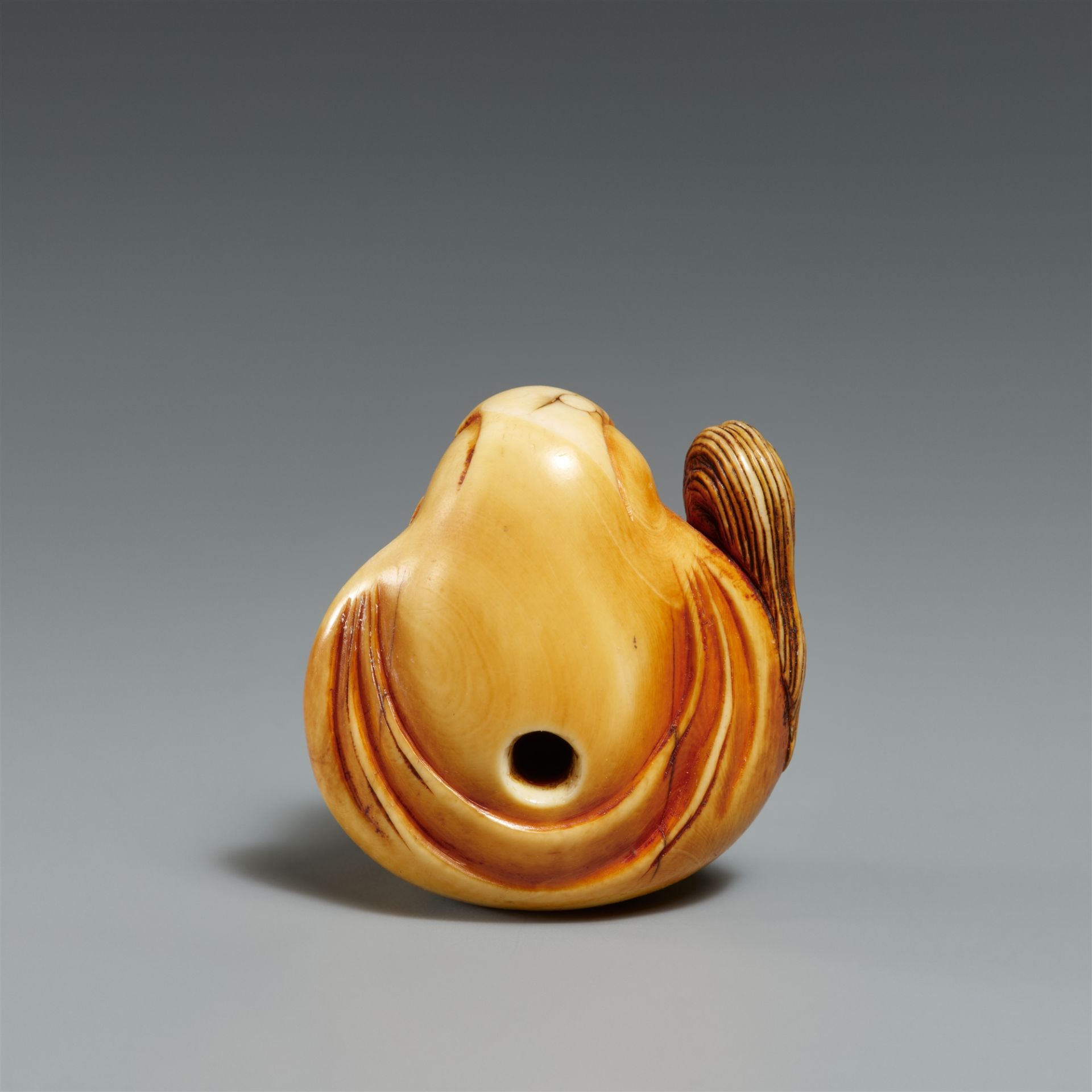 A stained ivory netsuke of a Daruma doll. Osaka. Ca. 1860 - Image 2 of 4