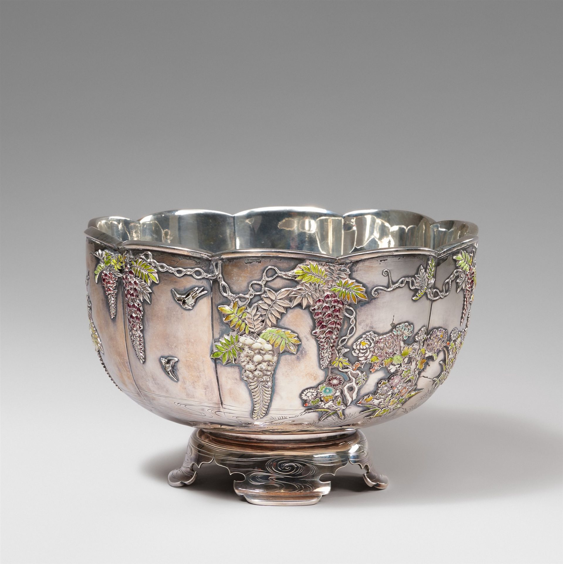 A double-walled silver bowl with translucent enamel. Around 1900