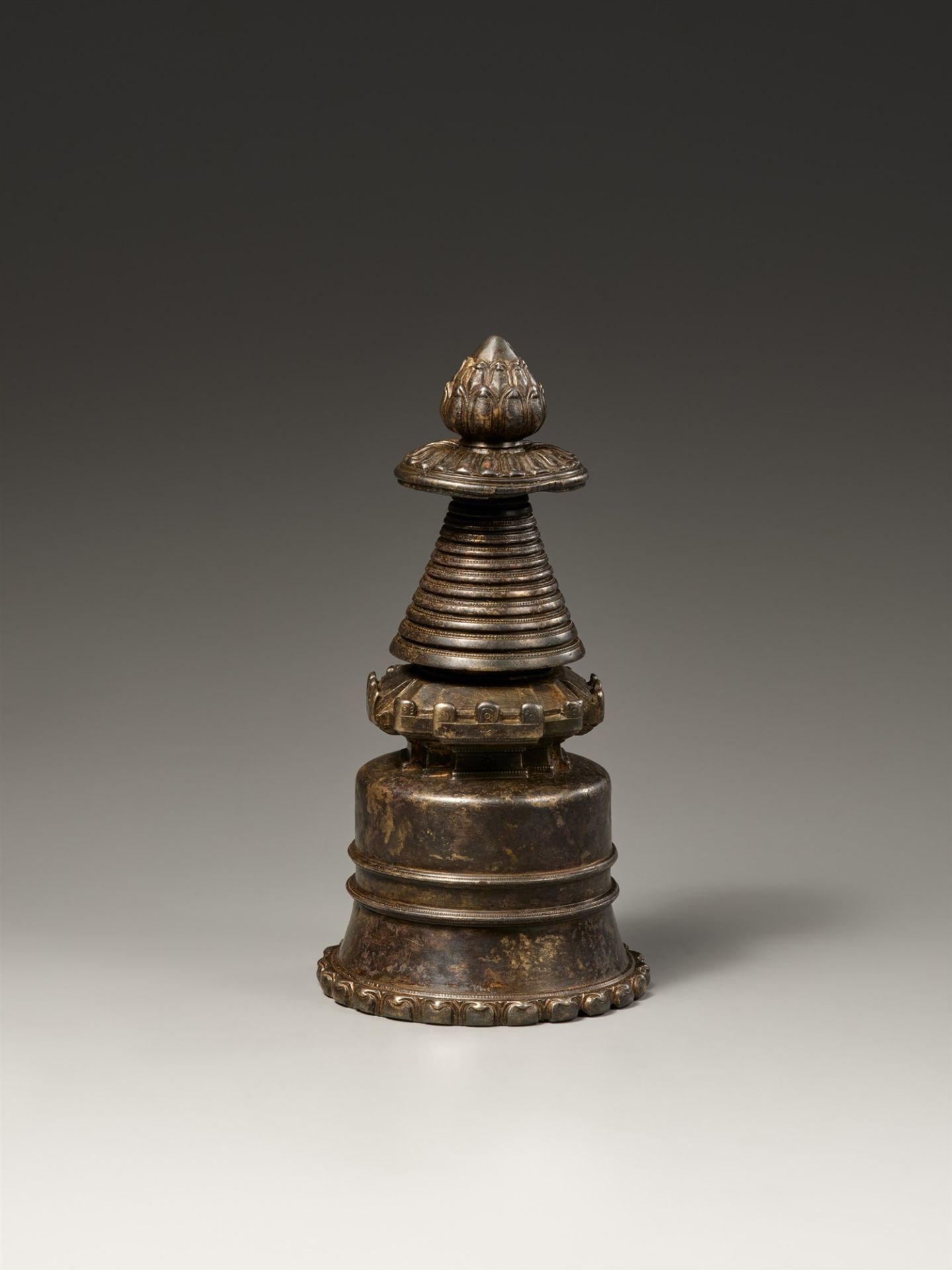 A Tibetan dark patinated copper alloy kadampa-stupa. 13th/14th century - Image 2 of 2