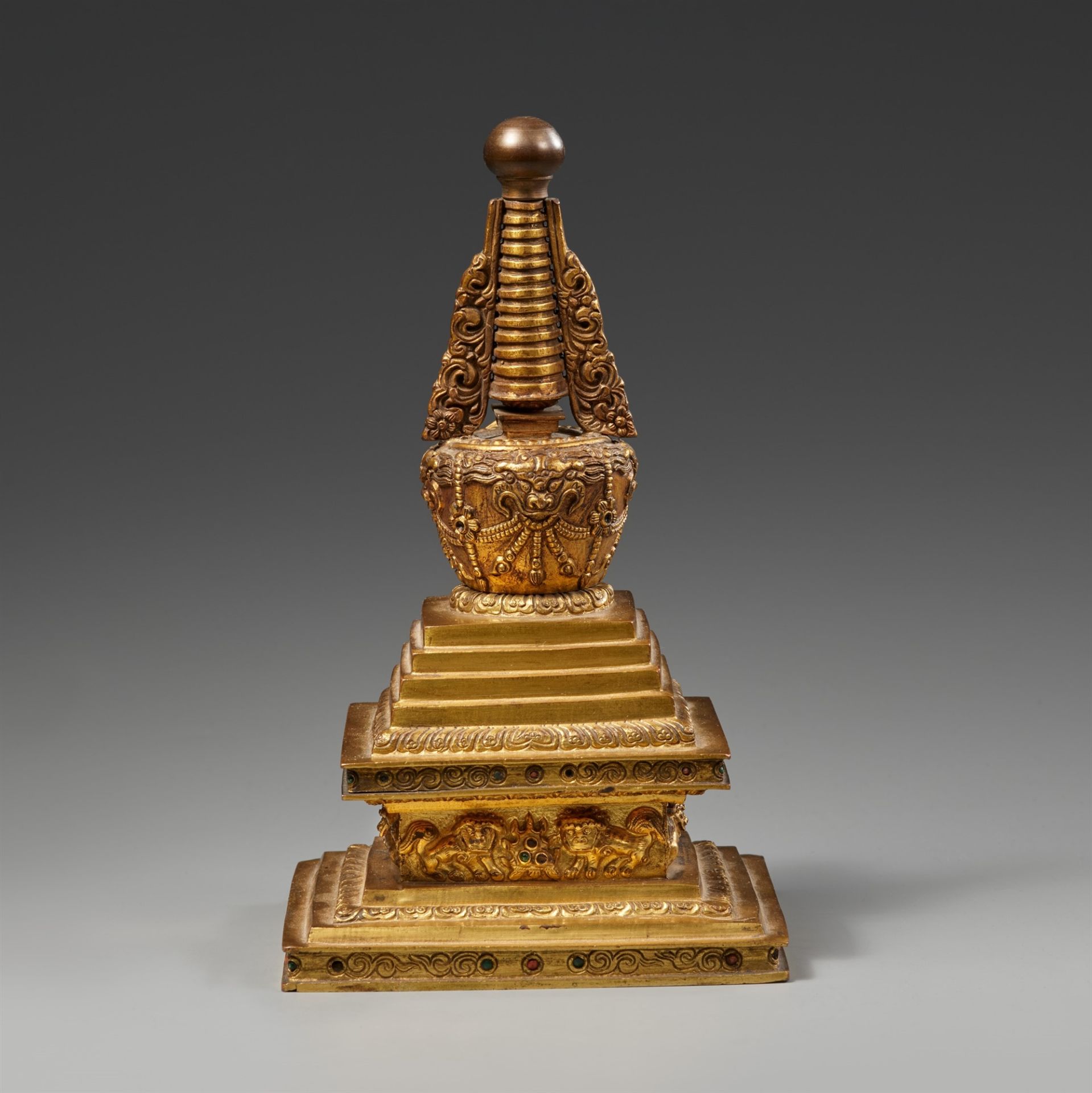 A Tibetan fire-gilt bronze bumpa-stupa. 18th century or later - Image 2 of 2