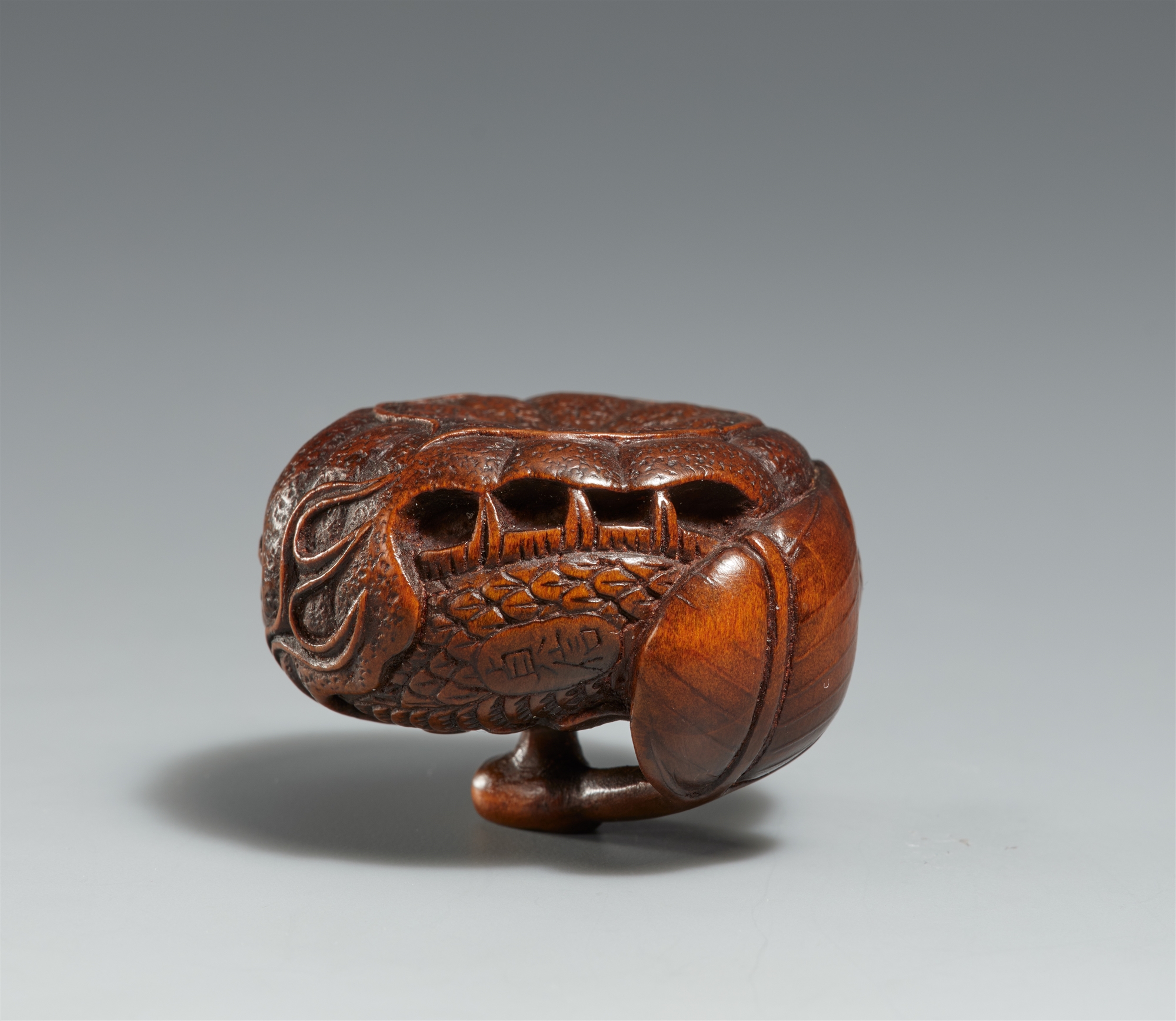 A boxwood netsuke of a dragon inside a mikan. Tanba. Mid-19th century - Image 2 of 2
