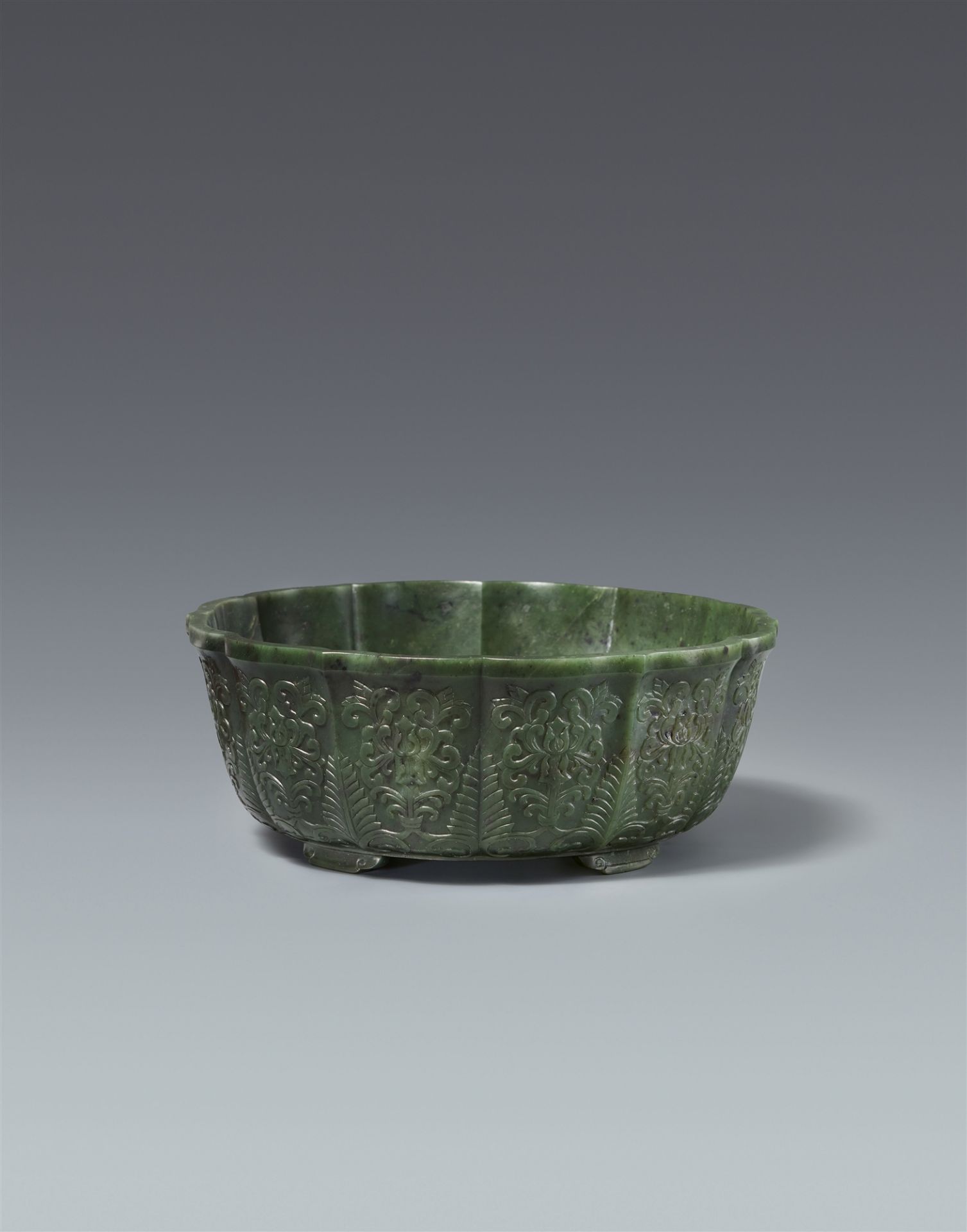 A spinach-green jade Mughal-style bowl. Qing dynasty