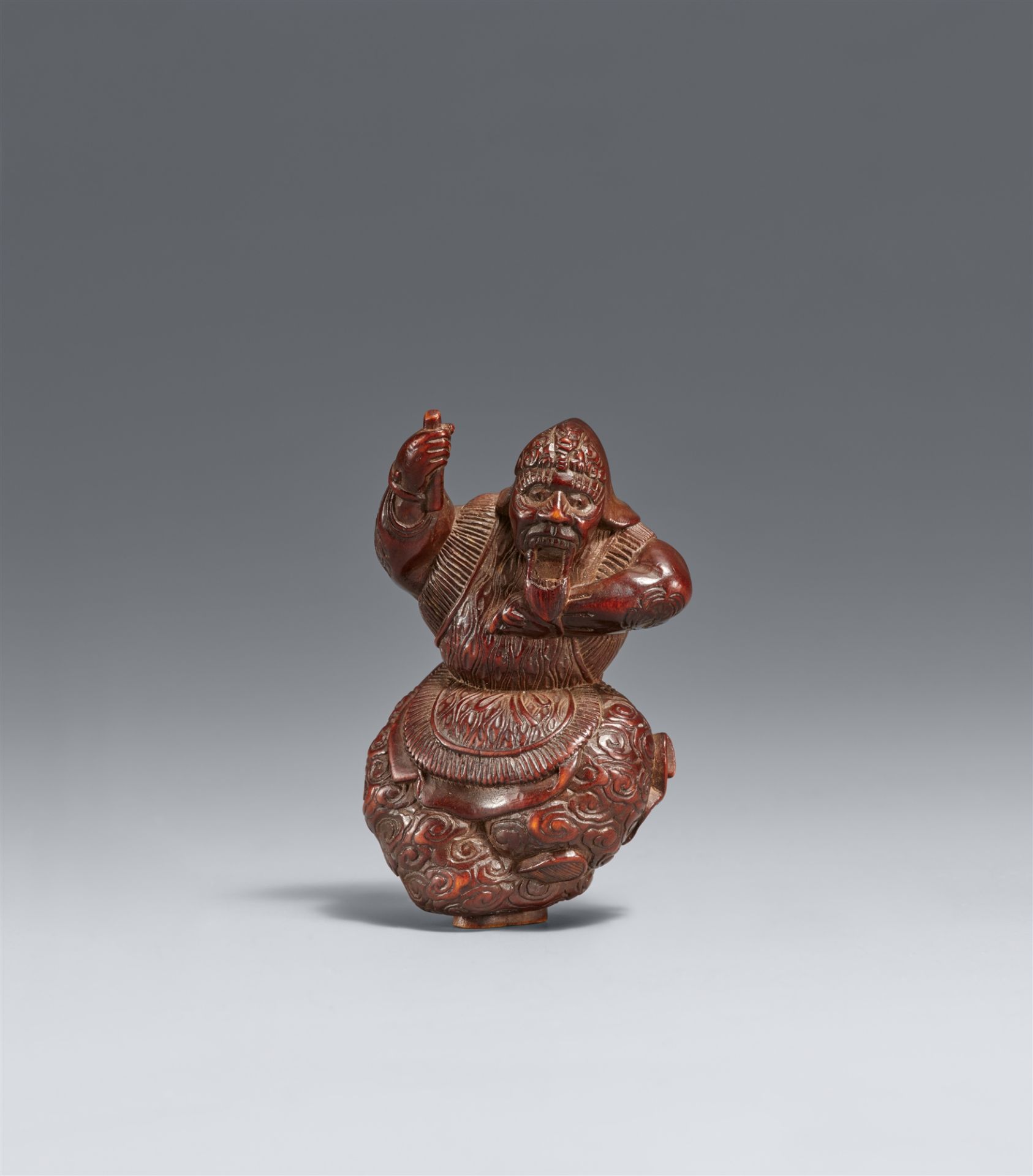 A Nagoya/Gifu wood netsuke of a Ranryô-ô dancer. 19th century