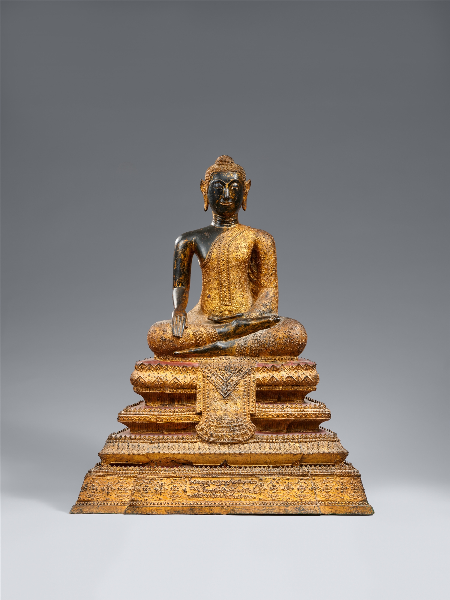 A Ratanakosin gilt-lacquered bronze figure of Buddha Shakyamuni. Thailand. 19th century